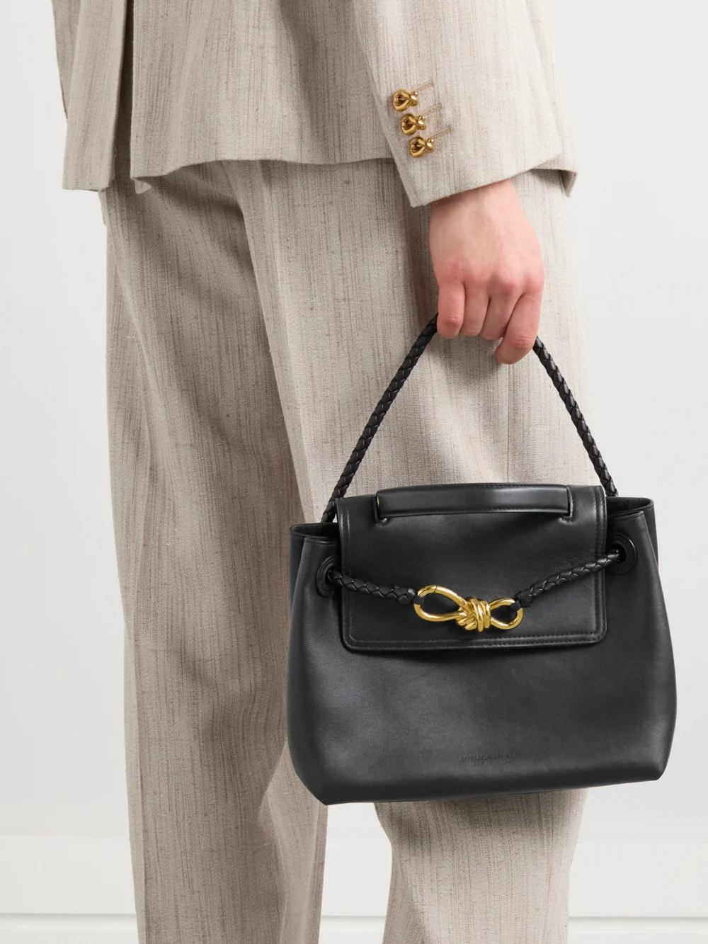 Bottega Veneta Ciao Ciao Small Leather Top-handle Bag, styled view