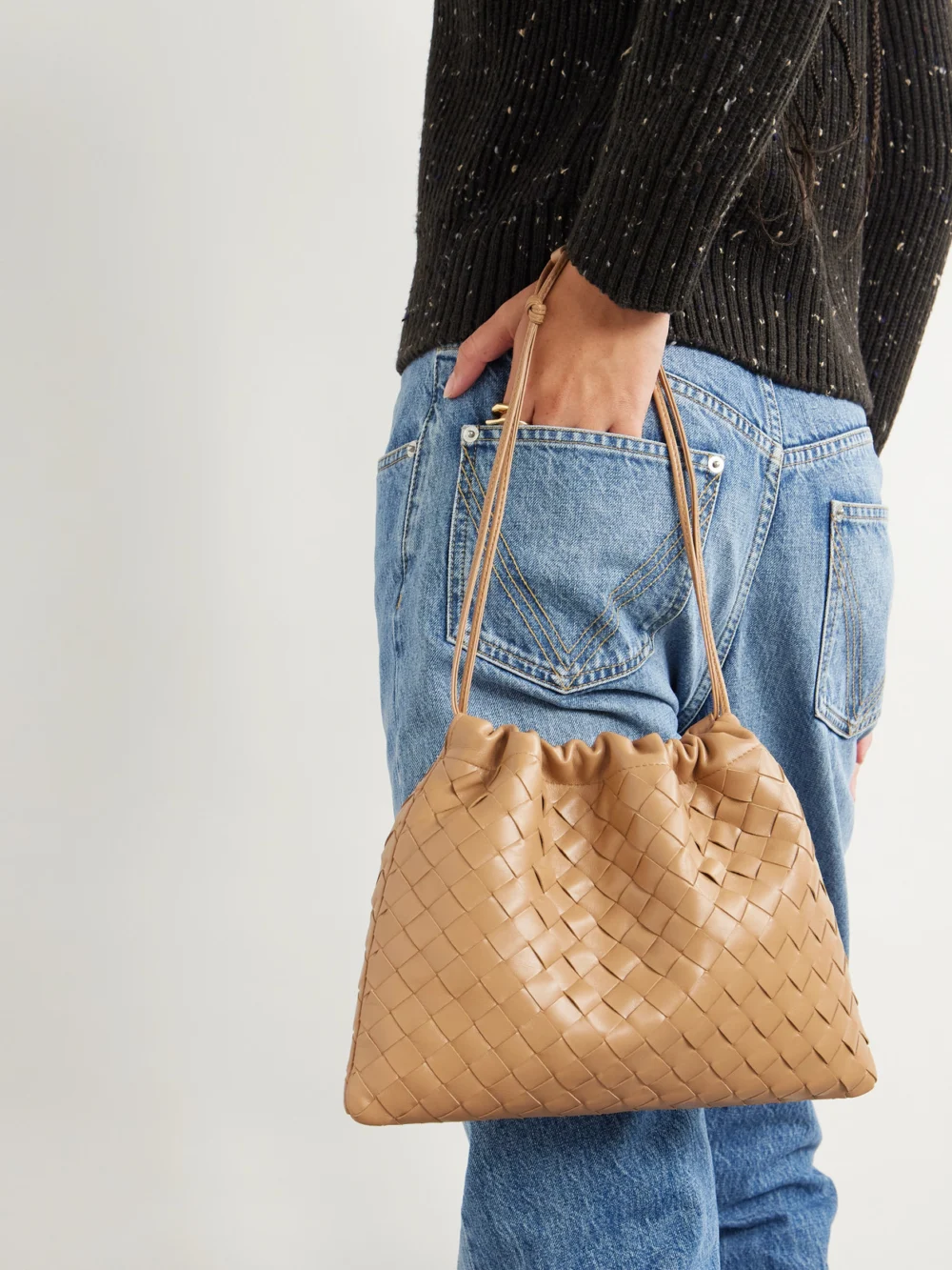 Bottega Veneta Dustbag Intrecciato Leather Pouch, styled view