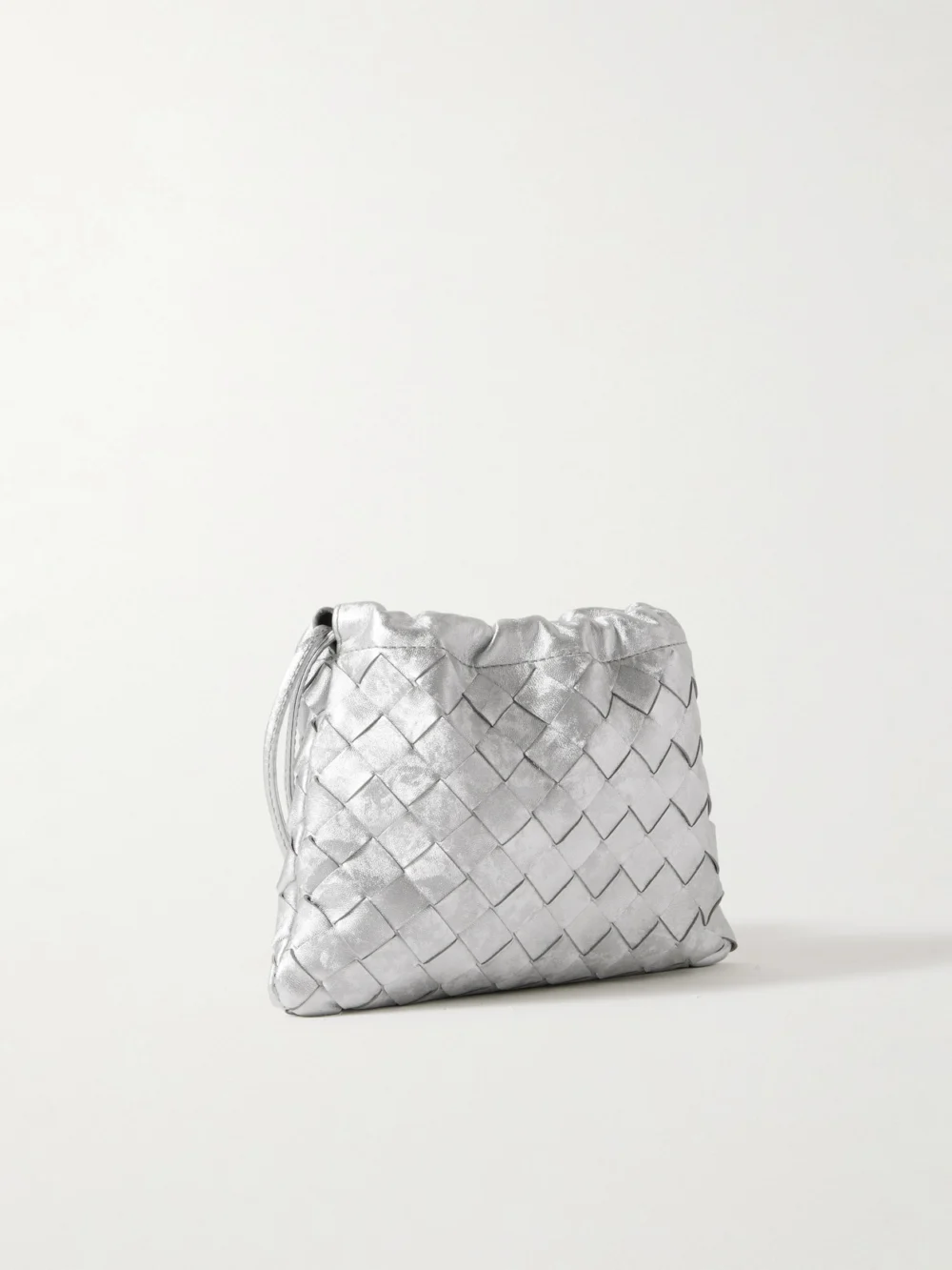 Back view of the Bottega Veneta Dustbag Small Intrecciato Metallic Leather Pouch