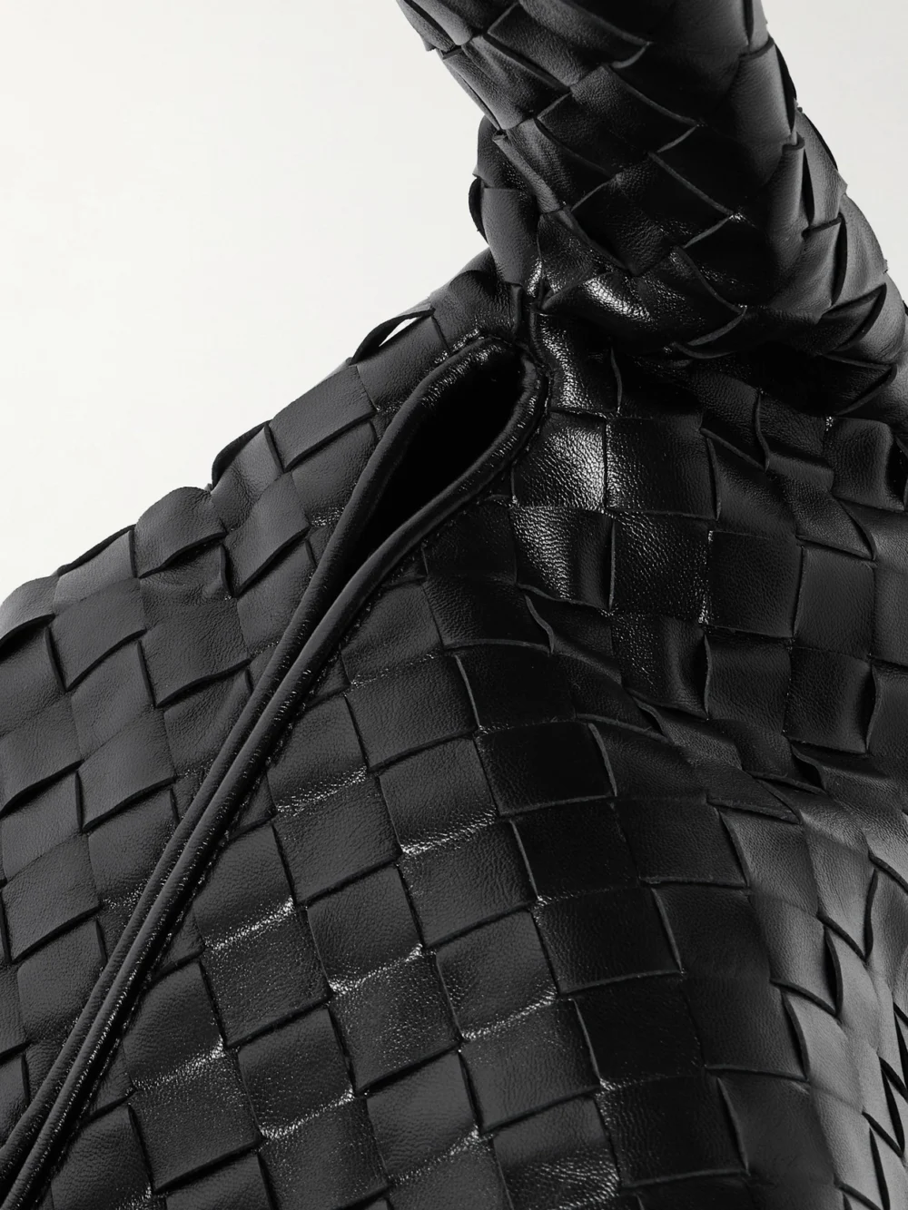 Close-up detail of the Bottega Veneta Hop Large Intrecciato Leather Tote