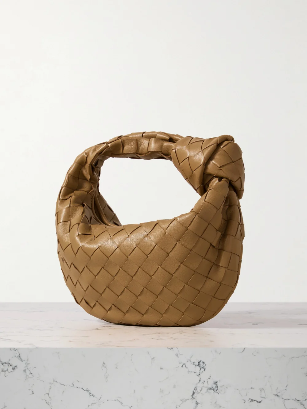 Back view of the Bottega Veneta Jodie Mini Intrecciato Leather Tote