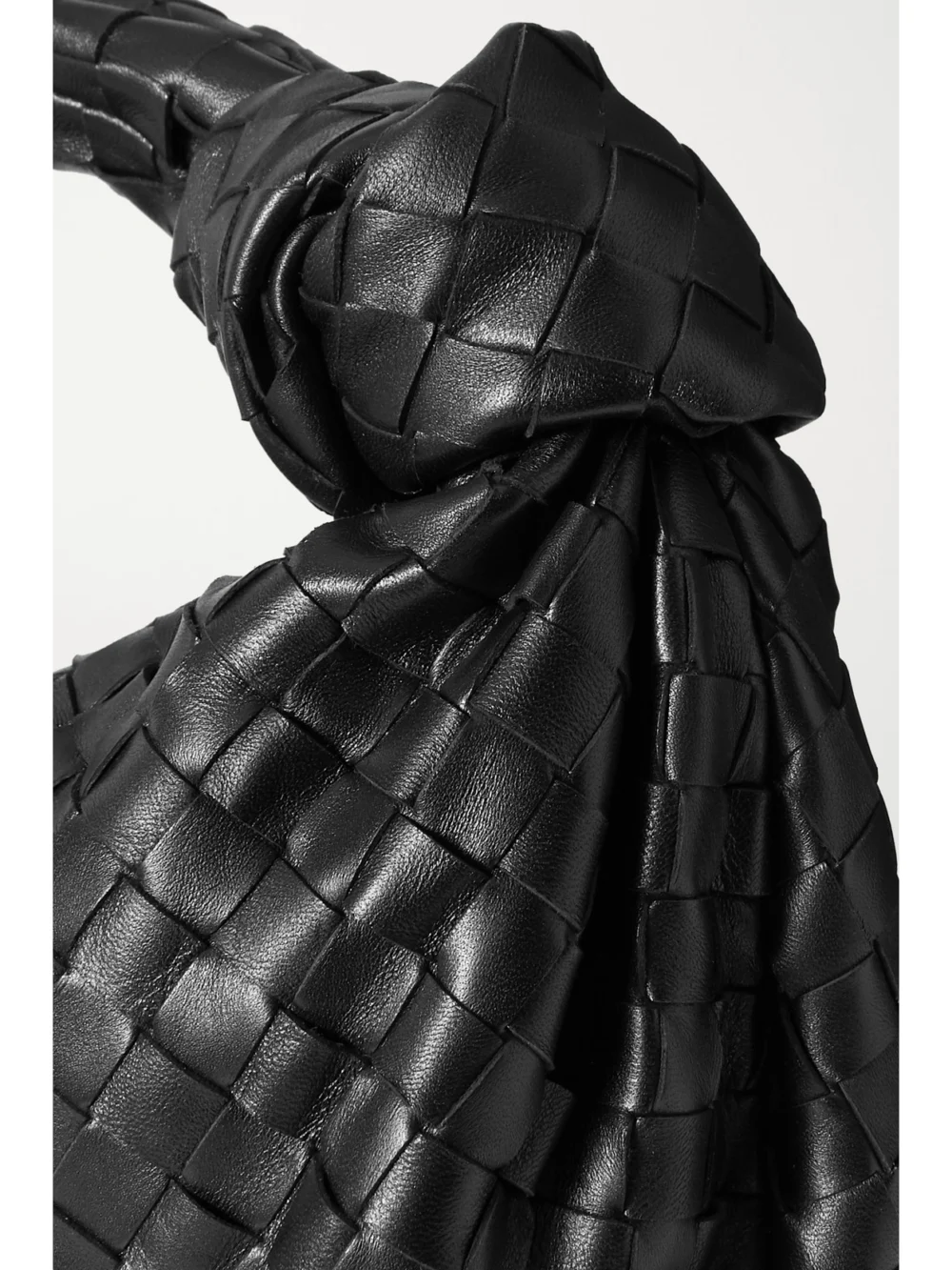 Close-up detail of the Bottega Veneta Jodie Small Intrecciato Leather Tote