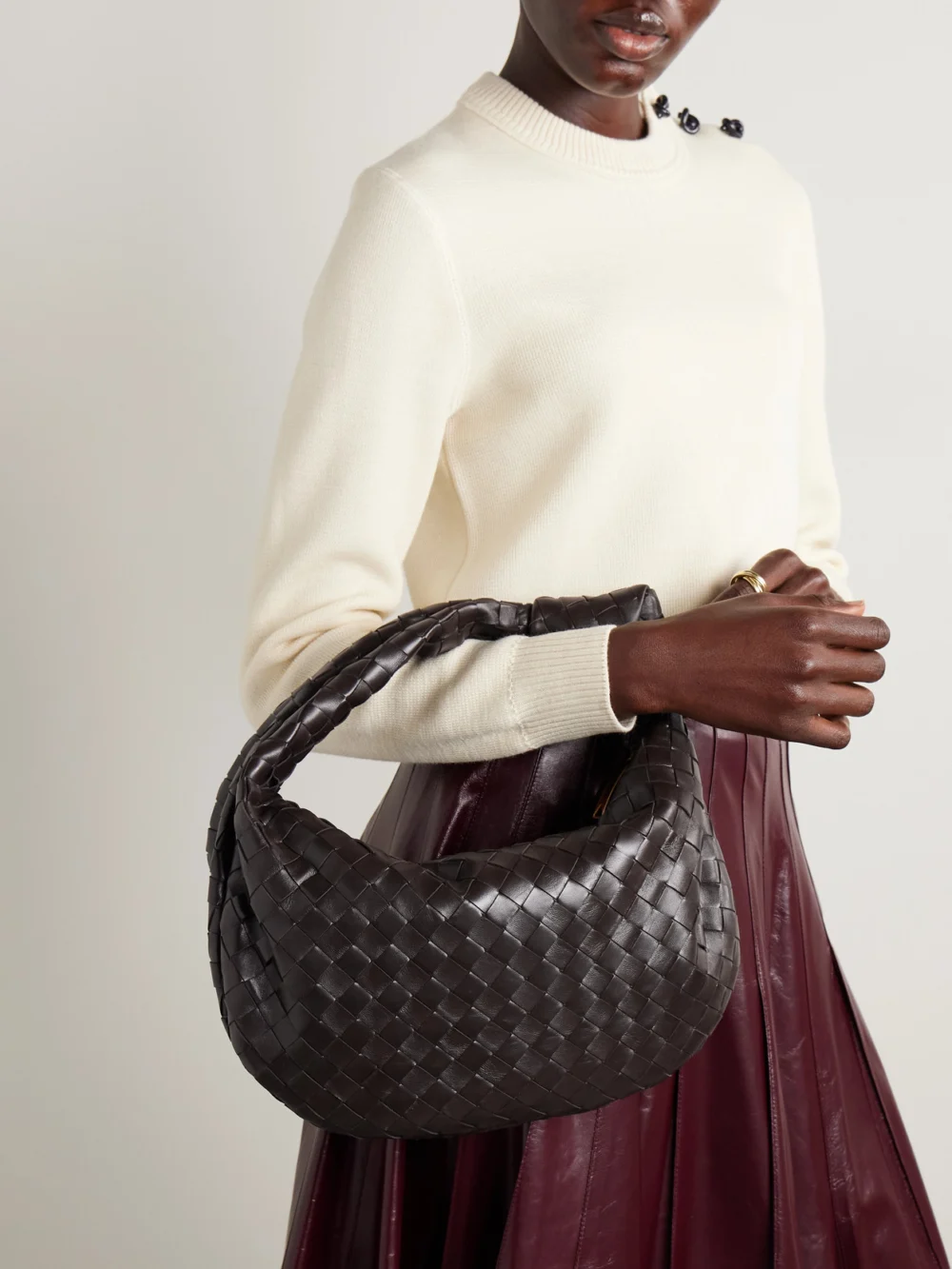 Bottega Veneta Jodie Small Intrecciato Leather Tote, styled view