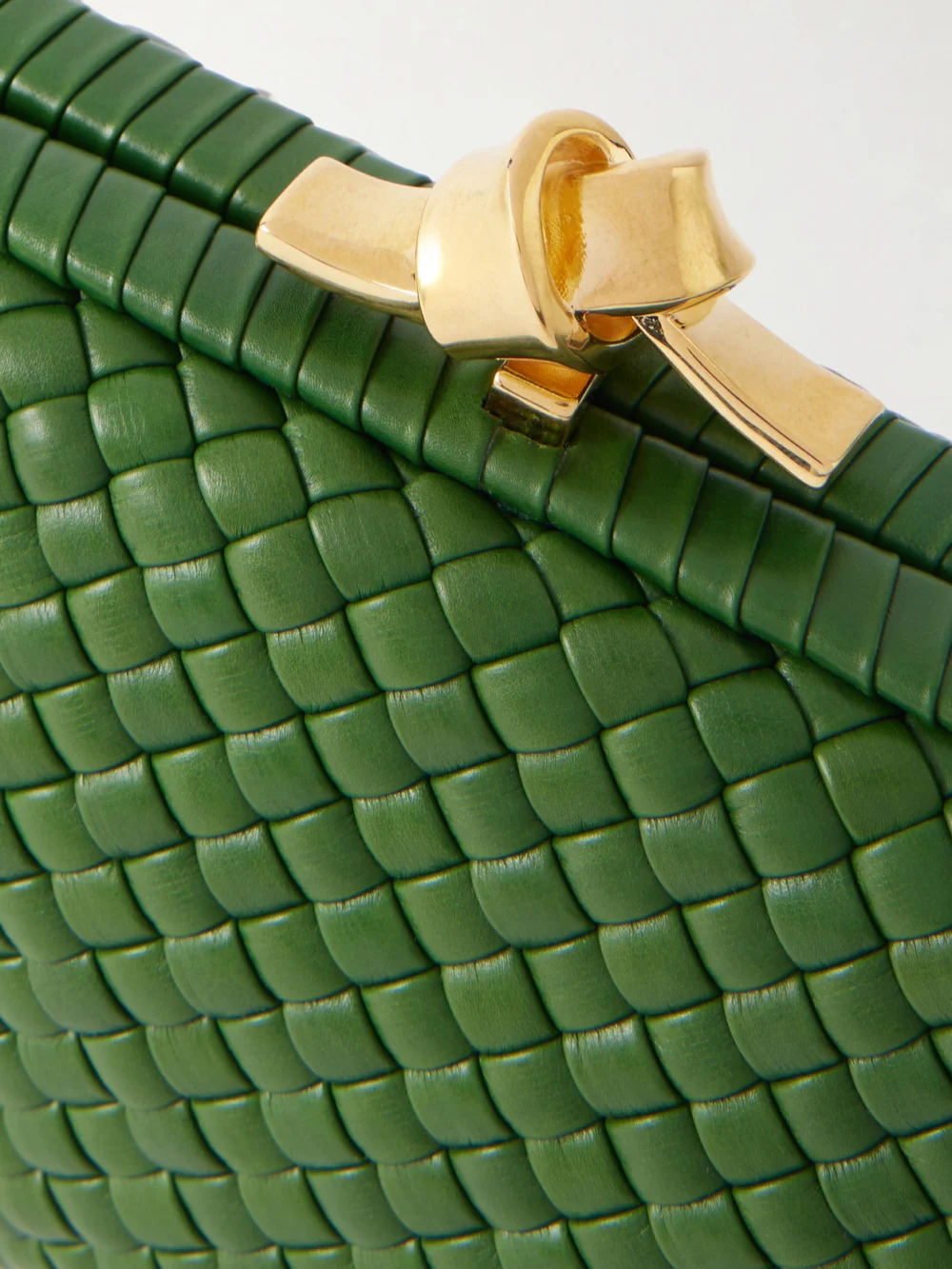 Close-up detail of the Bottega Veneta Knot Intrecciato Leather Clutch