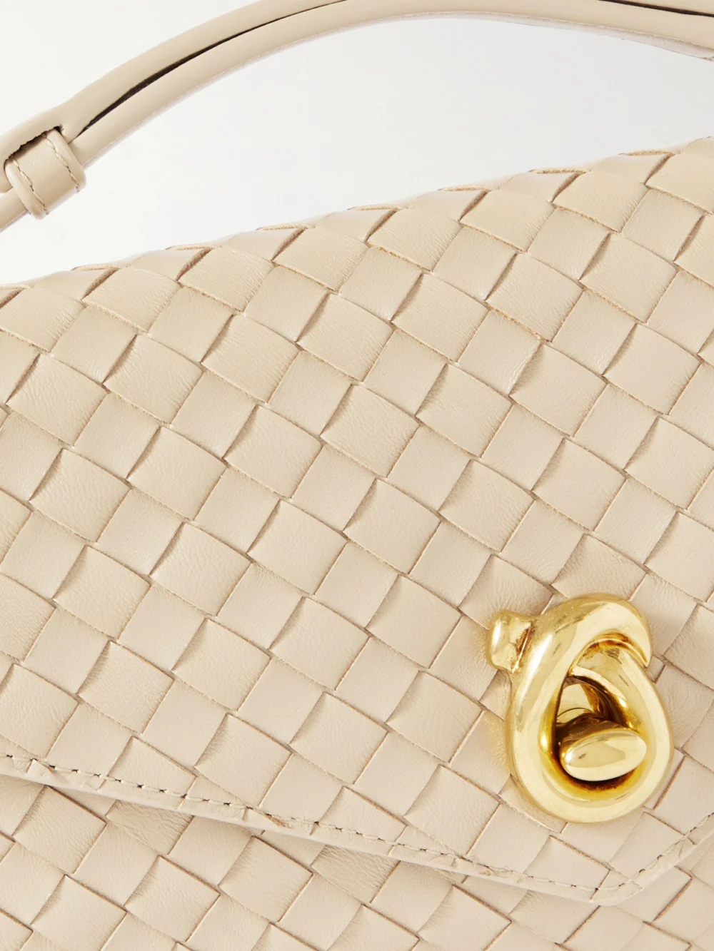 Close-up detail of the Bottega Veneta Knot Lock Medium Intrecciato Leather Top-handle Bag