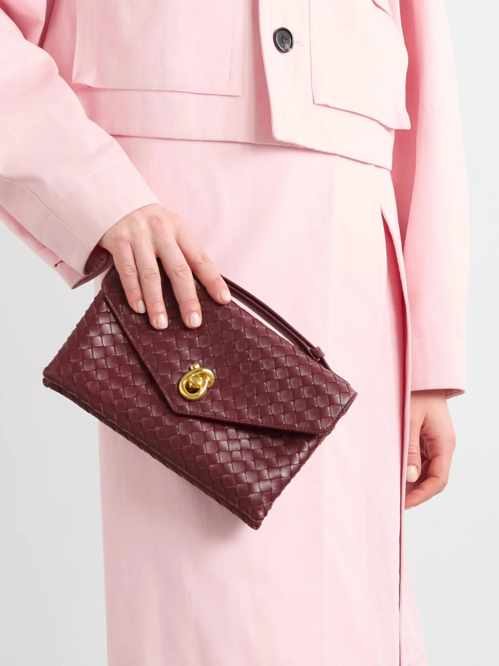 Bottega Veneta Knot Lock Medium Intrecciato Leather Top-handle Bag, styled view