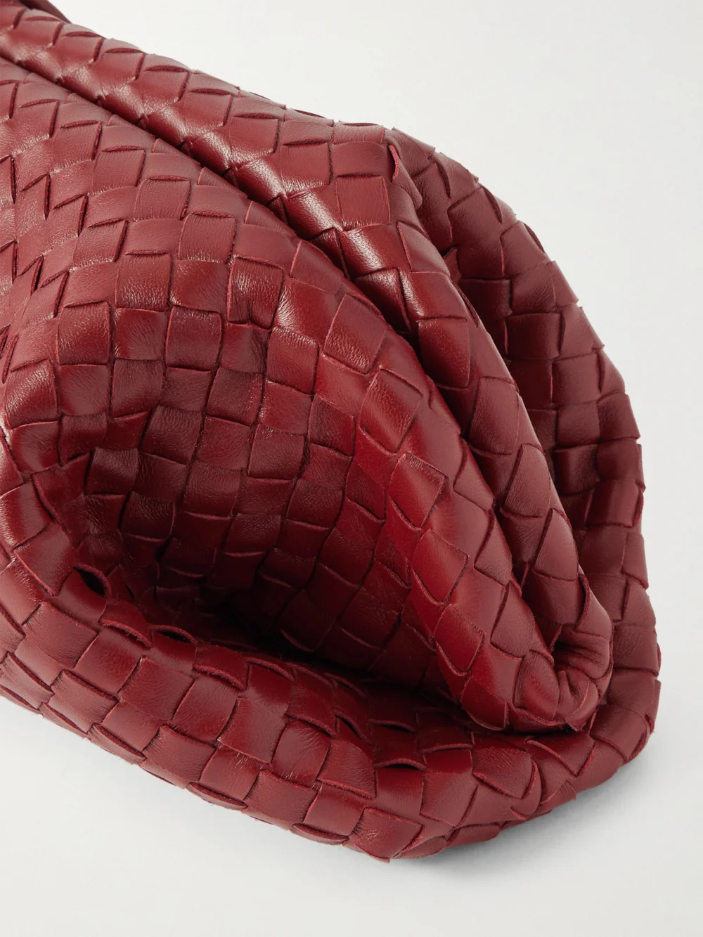 Close-up detail of the Bottega Veneta Lauren 1979 Intrecciato Leather Clutch