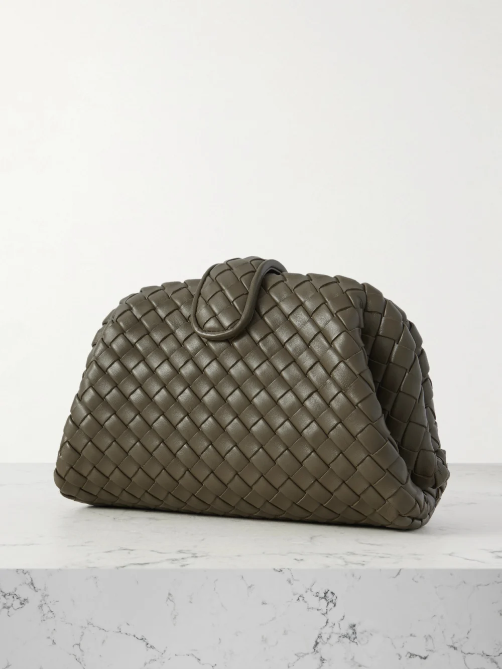 Back view of the Bottega Veneta Lauren 1980 Small Intrecciato Leather Clutch