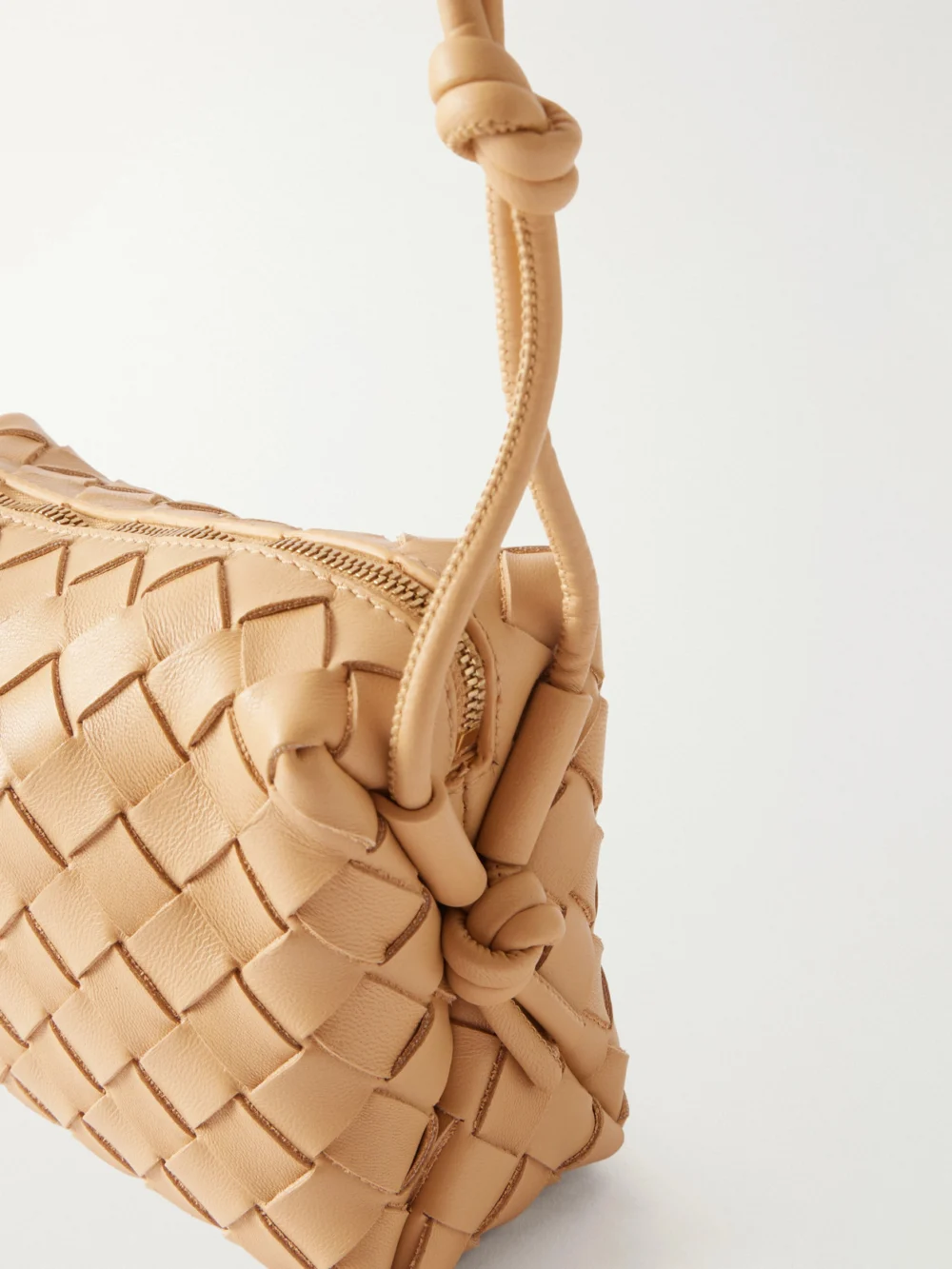 Close-up detail of the Bottega Veneta Loop Mini Intrecciato Leather Shoulder Bag