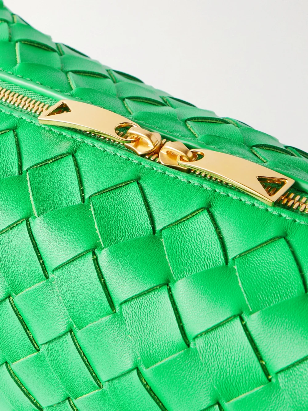 Close-up detail of the Bottega Veneta Loop Mini Intrecciato Leather Shoulder Bag