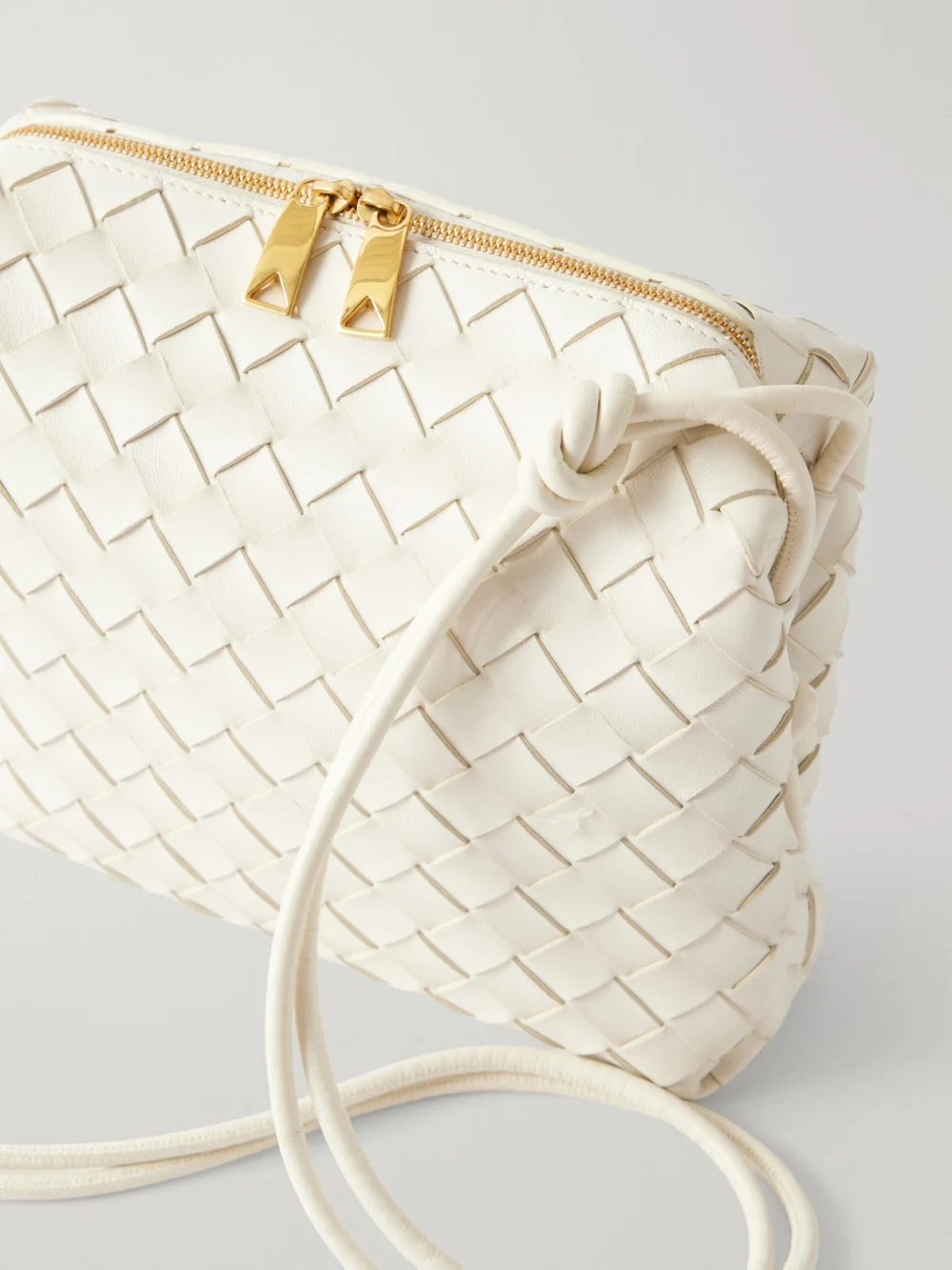 Close-up detail of the Bottega Veneta Loop Small Intrecciato Leather Shoulder Bag