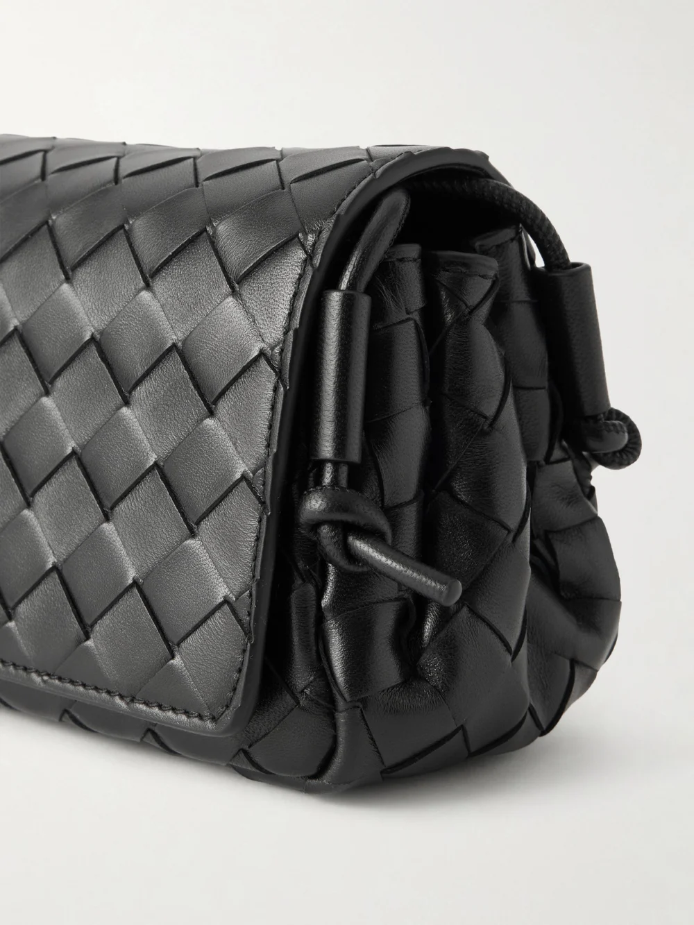 Close-up detail of the Bottega Veneta Notturno Intrecciato Leather Shoulder Bag