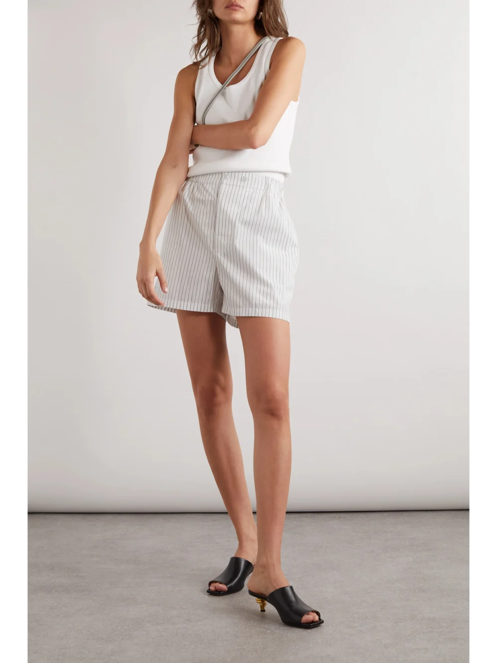 Bottega Veneta Pinstriped Cotton-poplin Shorts, worn by a model