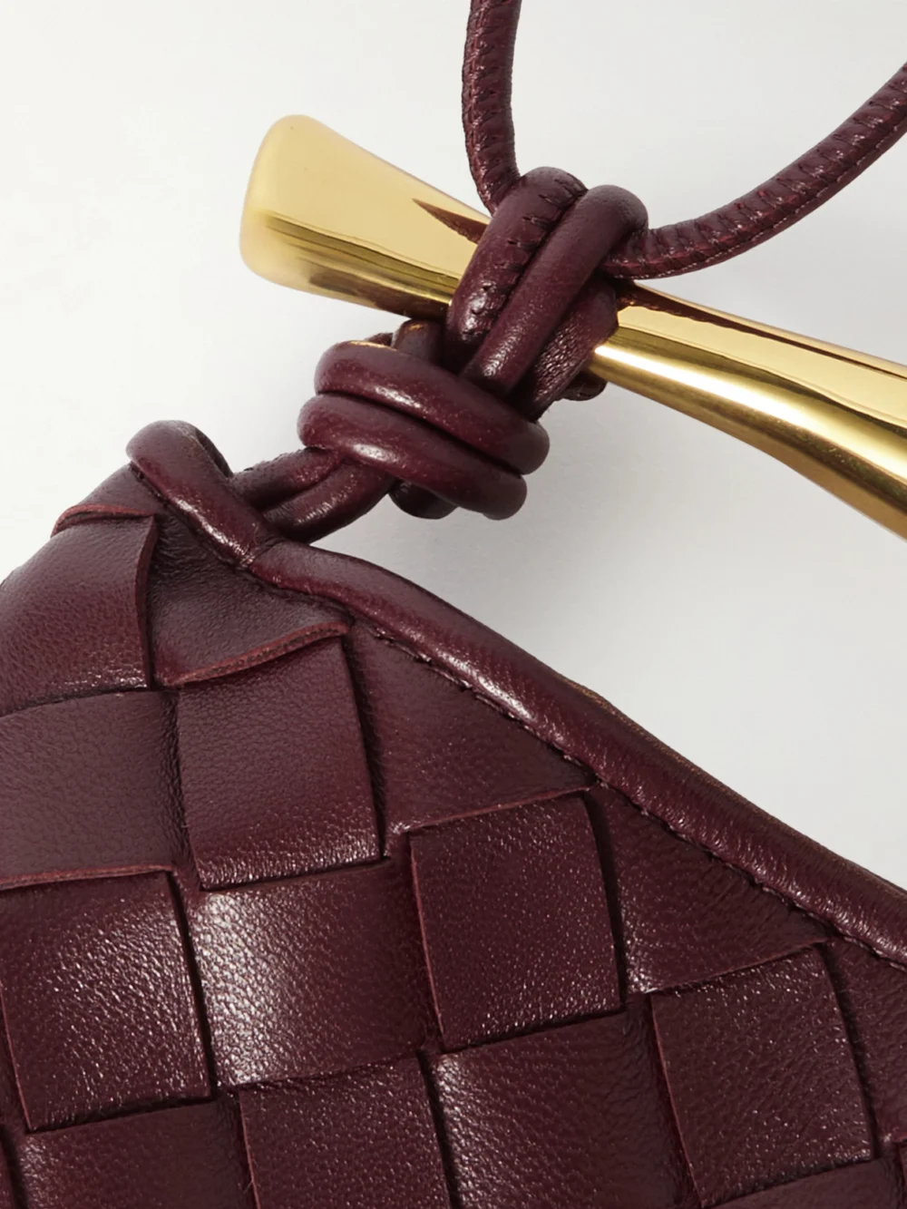 Close-up detail of the Bottega Veneta Sardine Mini Intrecciato Leather Shoulder Bag