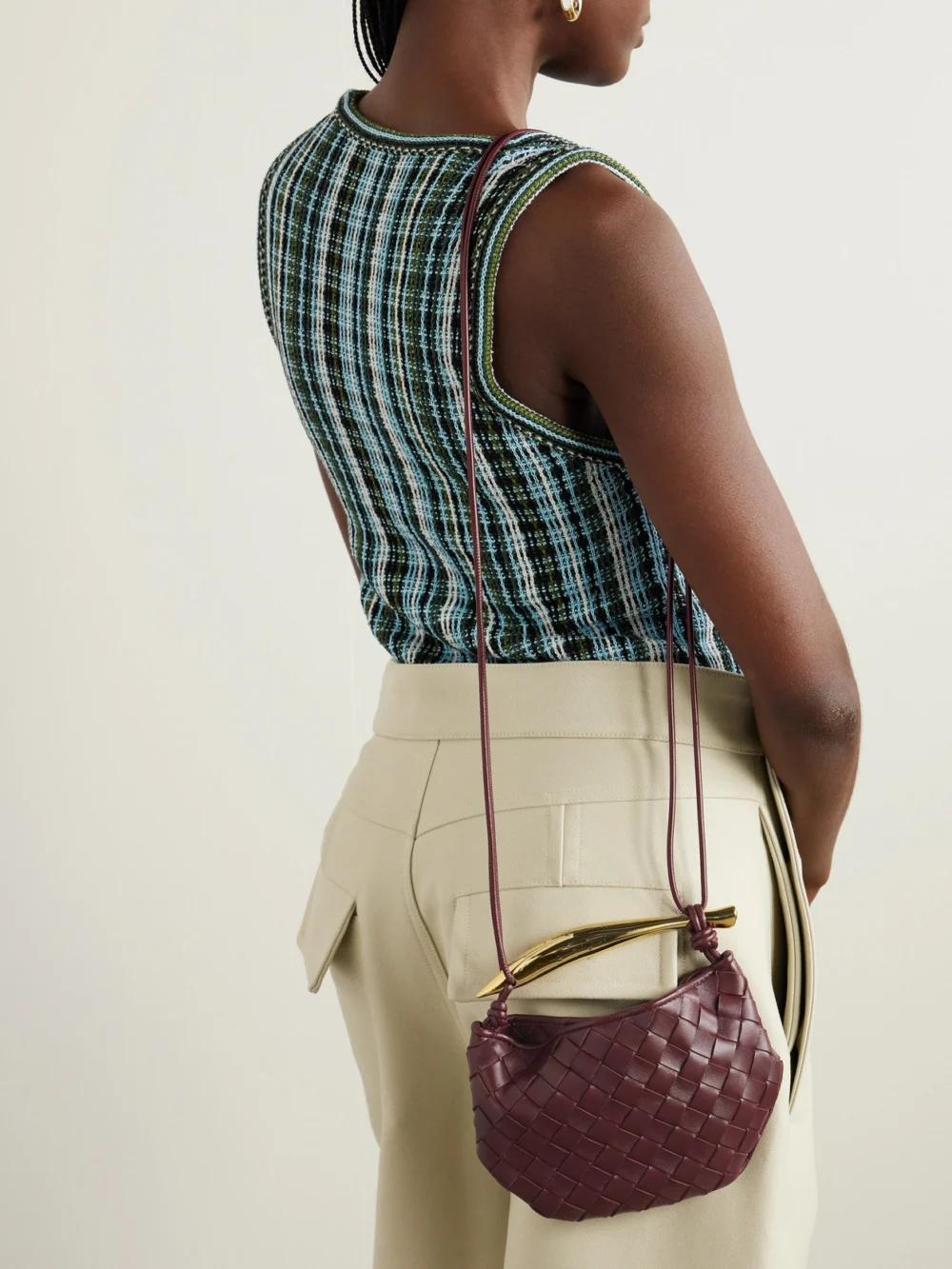 Bottega Veneta Sardine Mini Intrecciato Leather Shoulder Bag, styled view