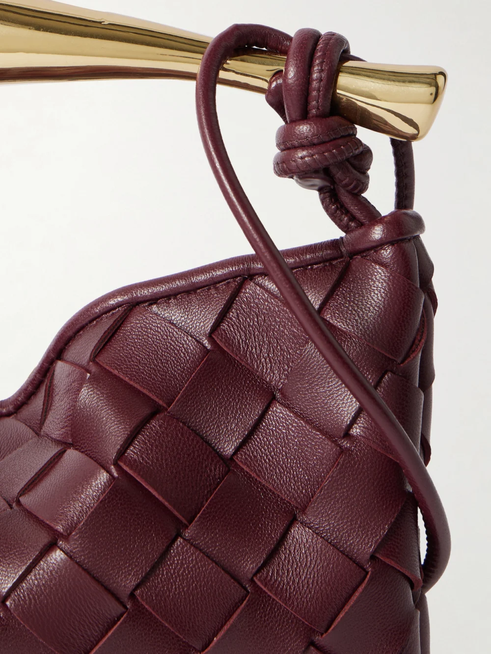 Close-up detail of the Bottega Veneta Sardine Mini Intrecciato Leather Top-handle Bag