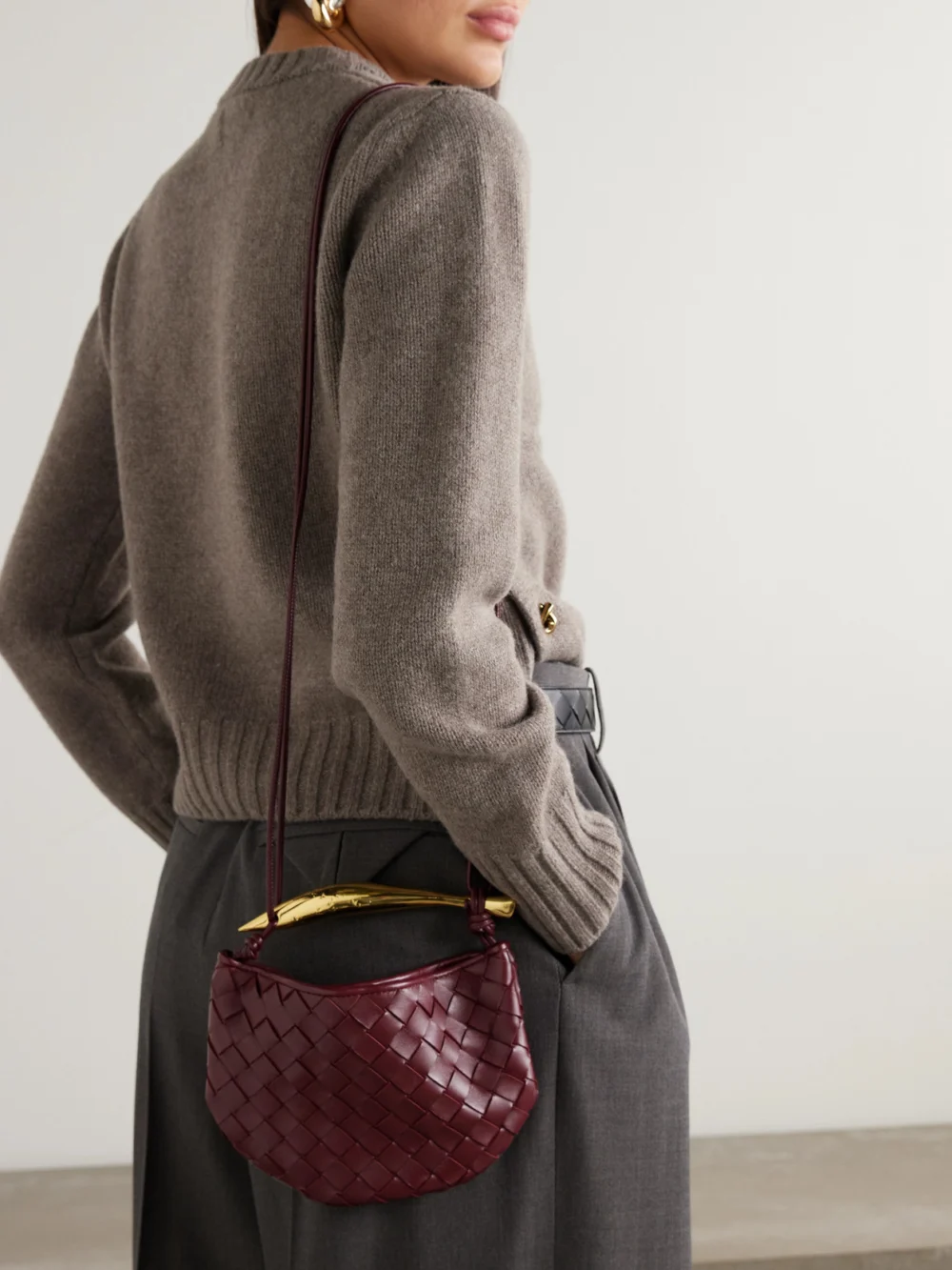 Bottega Veneta Sardine Mini Intrecciato Leather Top-handle Bag, styled view