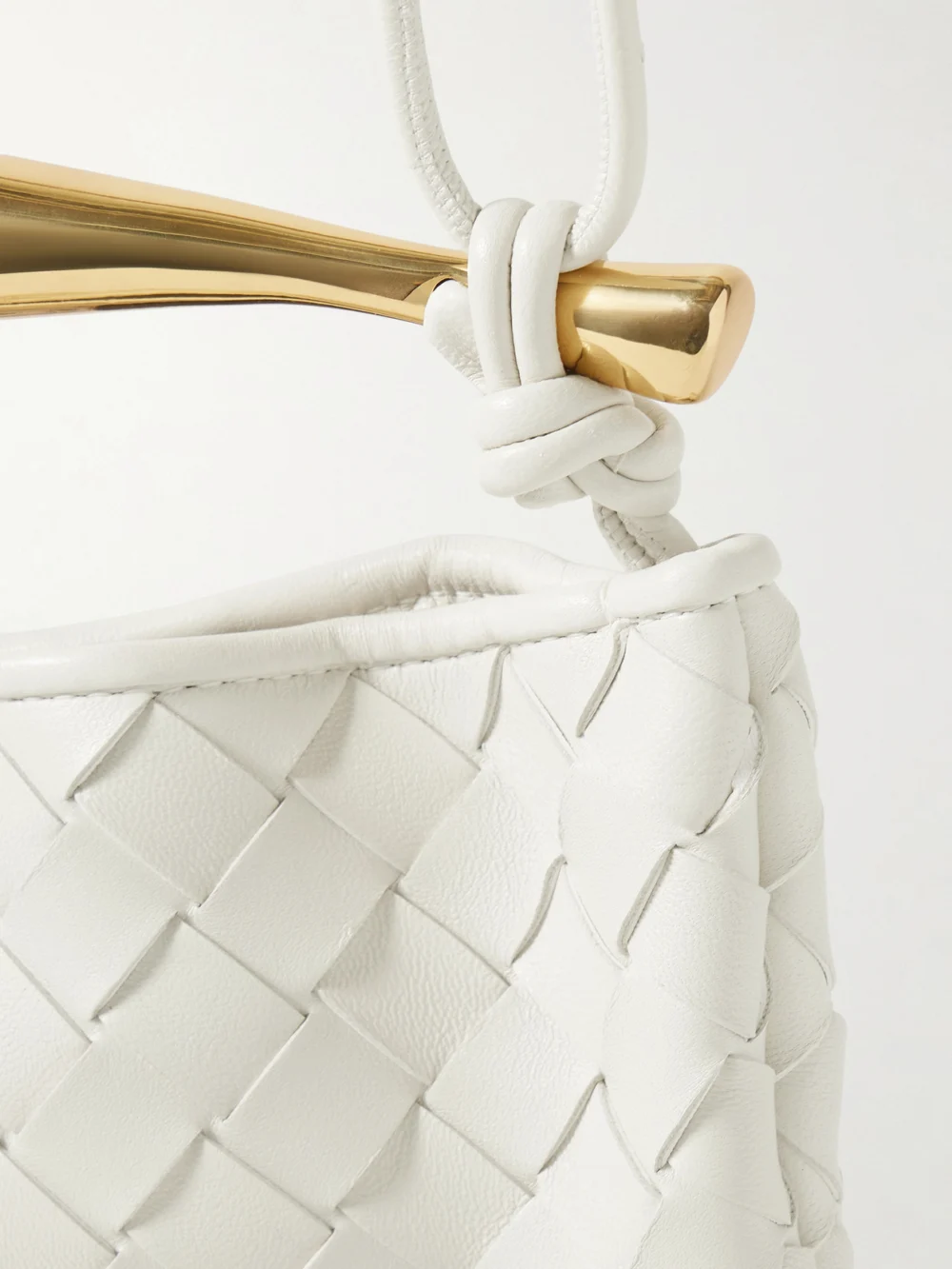 Close-up detail of the Bottega Veneta Sardine Mini Intrecciato Leather Top-handle Bag