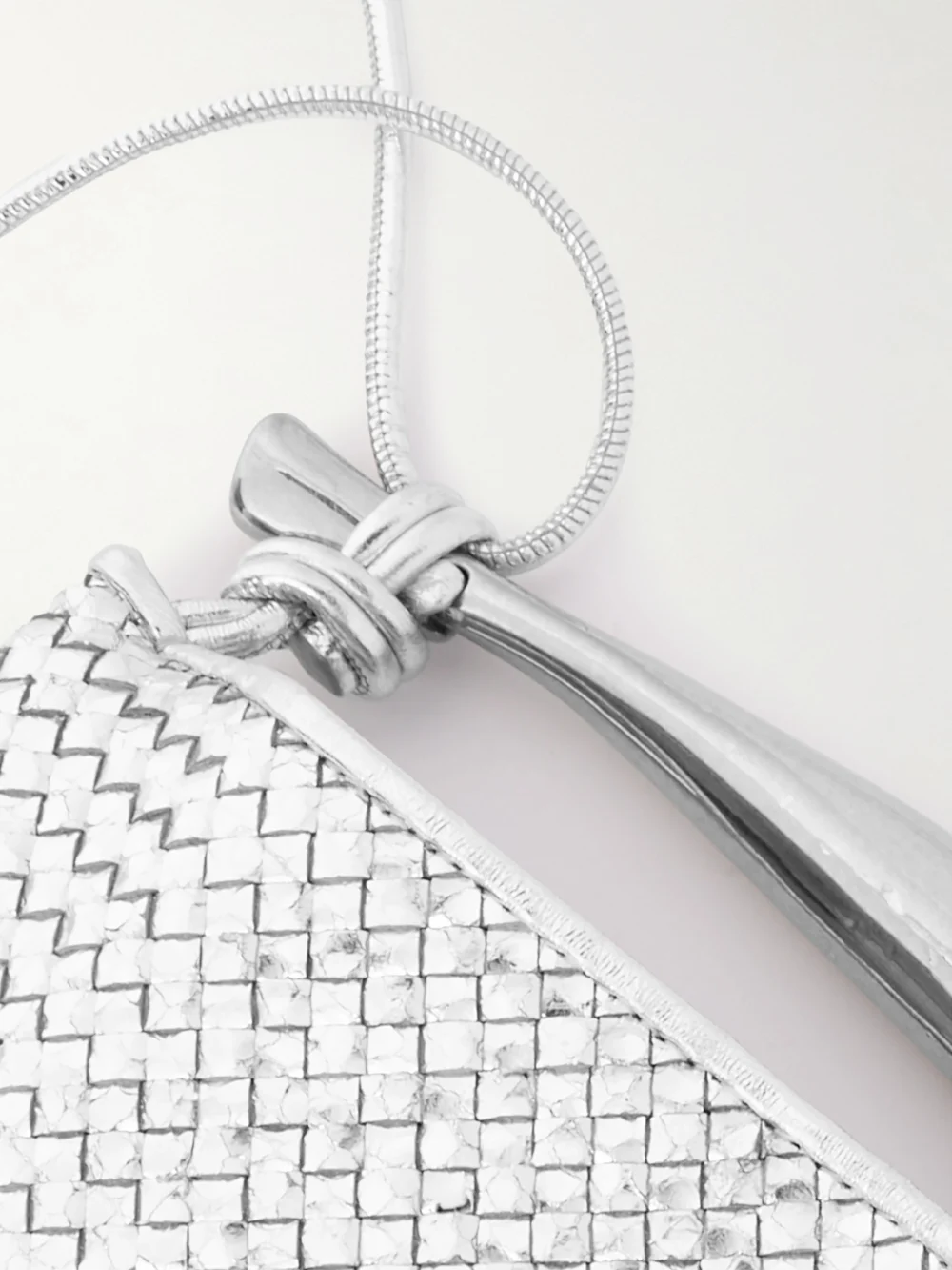 Close-up detail of the Bottega Veneta Sardine Mini Intrecciato Metallic Leather Shoulder Bag