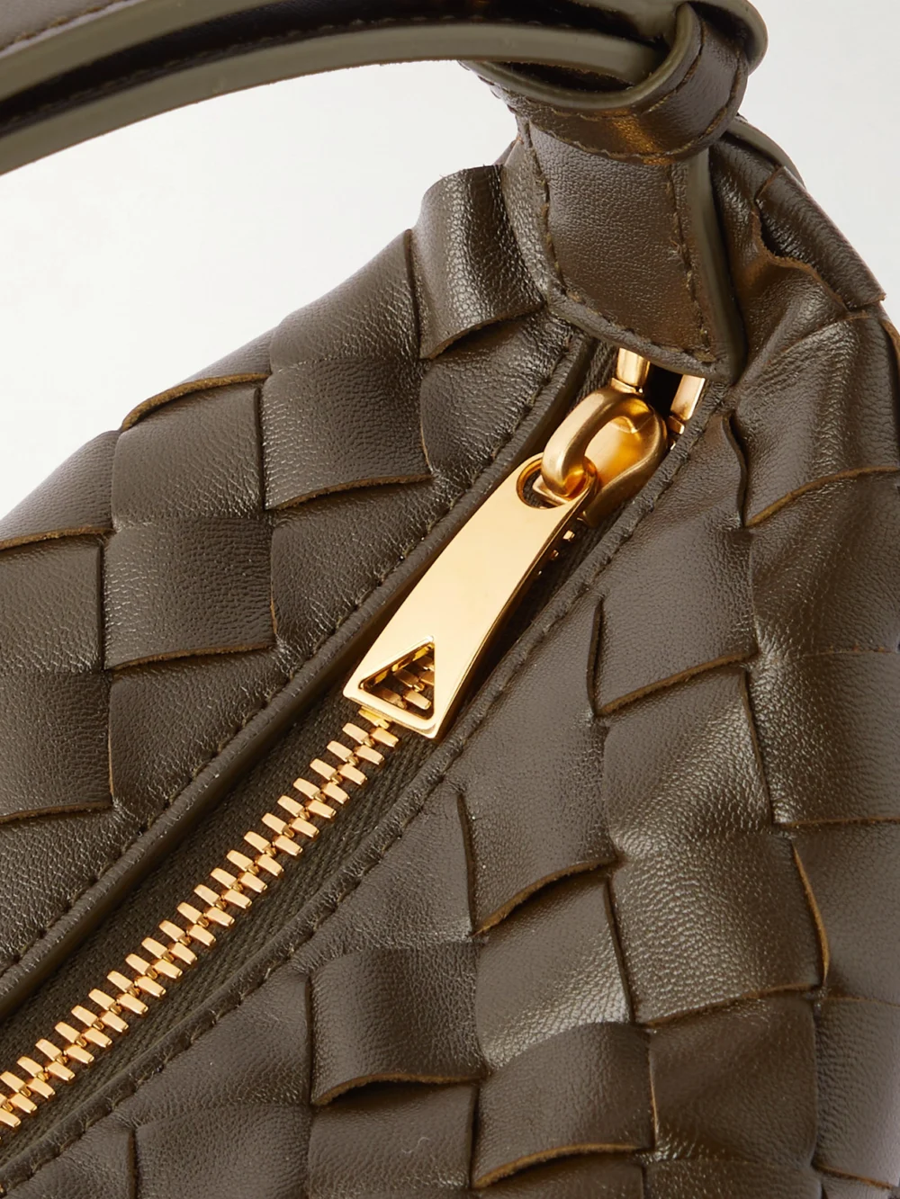 Close-up detail of the Bottega Veneta Wallace Mini Intrecciato Leather Shoulder Bag