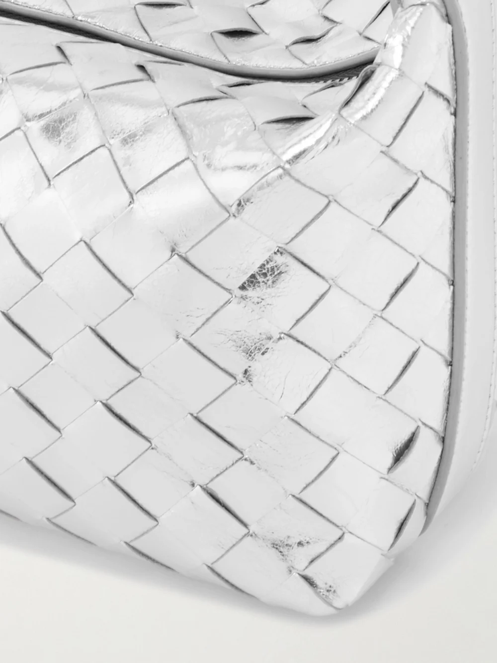 Close-up detail of the Bottega Veneta Wallace Mini Intrecciato Metallic Leather Shoulder Bag