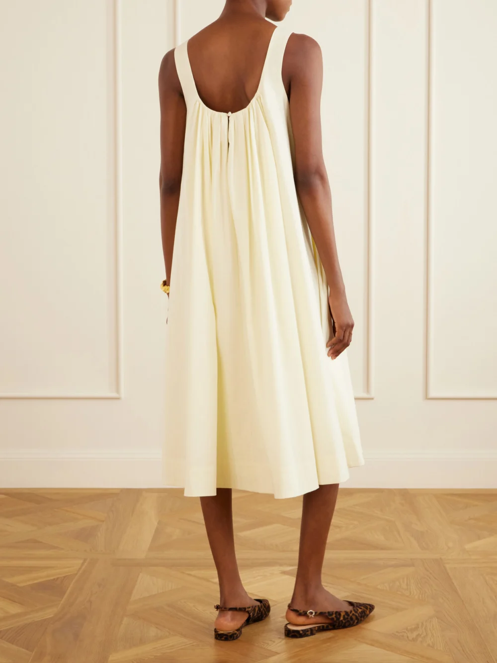 Back view of the Brandon Maxwell The Lennox Pleated Stretch-cotton Poplin Midi Dress