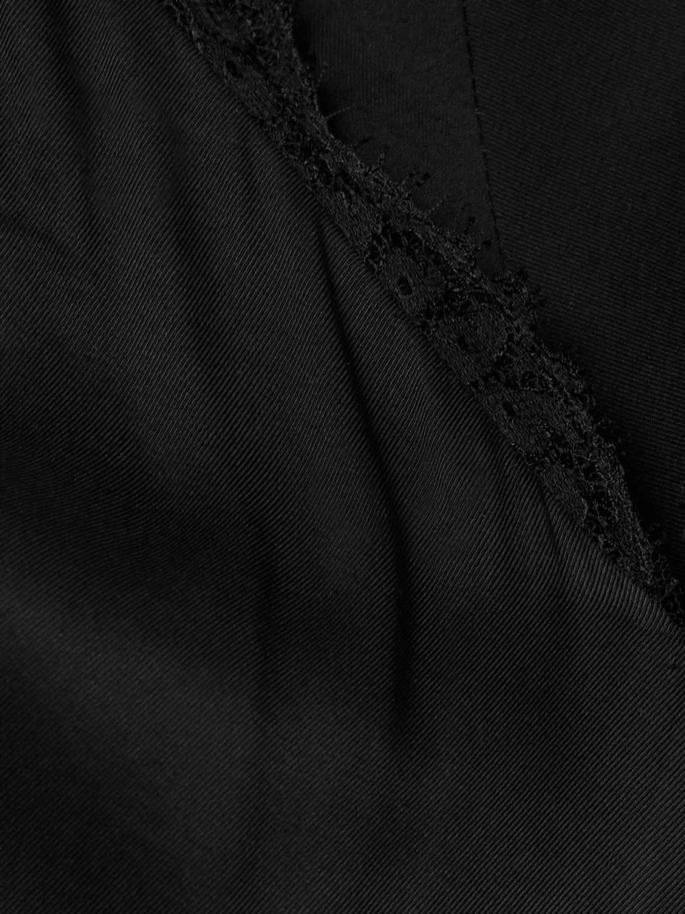 Close-up detail of the Brandon Maxwell The Malone Lace-trimmed Twill Gown