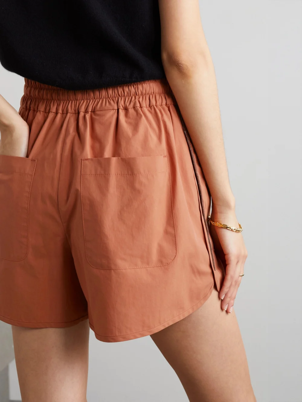 Back view of the Brunello Cucinelli Bead-embellished Cotton-poplin Shorts
