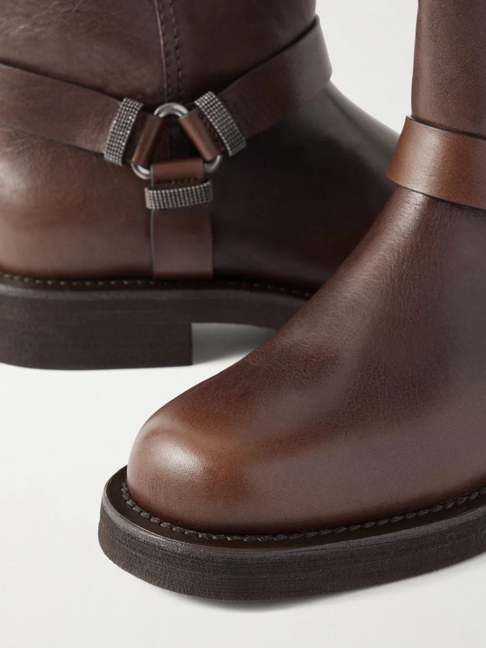 Close-up detail of the Brunello Cucinelli Bead-embellished Leather Biker Boots