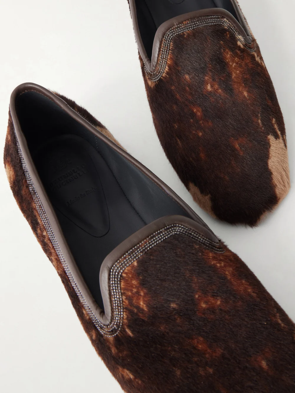 Close-up detail of the Brunello Cucinelli Bead-embellished Leather-trimmed Brushed Loafers
