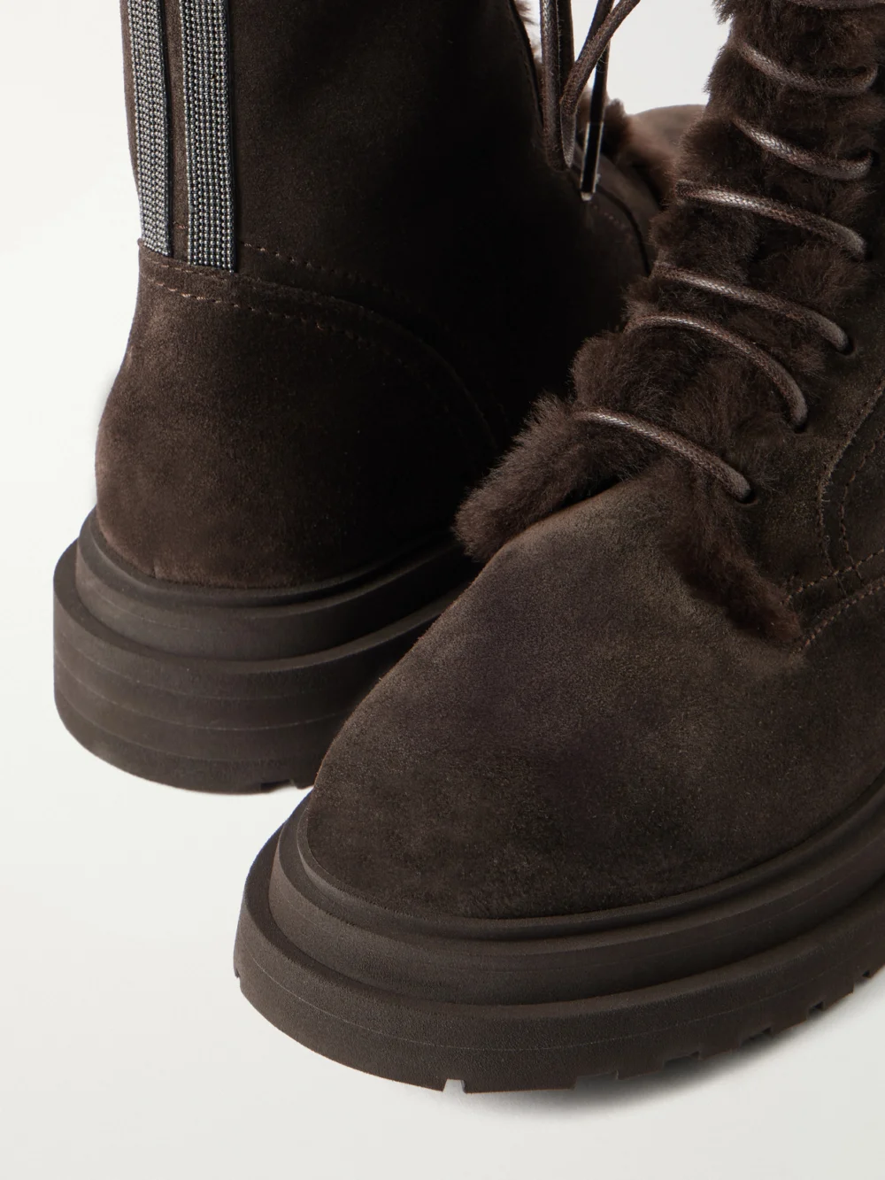 Close-up detail of the Brunello Cucinelli Bead-embellished Shearling-lined Suede Ankle Boots