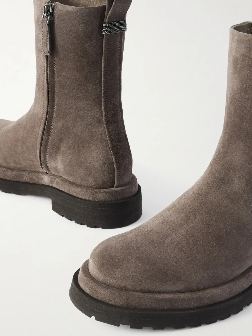 Close-up detail of the Brunello Cucinelli Bead-embellished Suede Ankle Boots