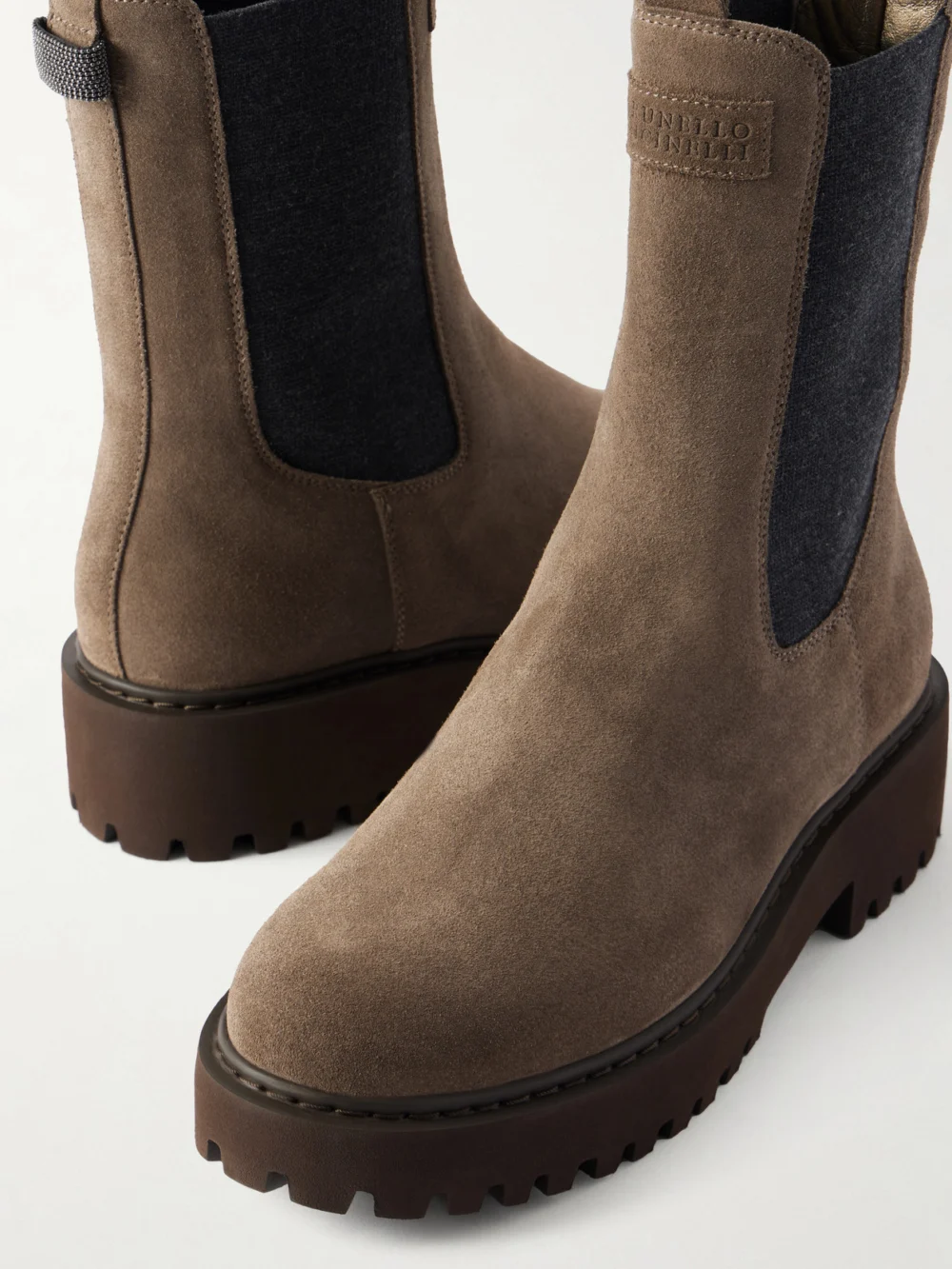 Close-up detail of the Brunello Cucinelli Bead-embellished Suede Ankle Boots
