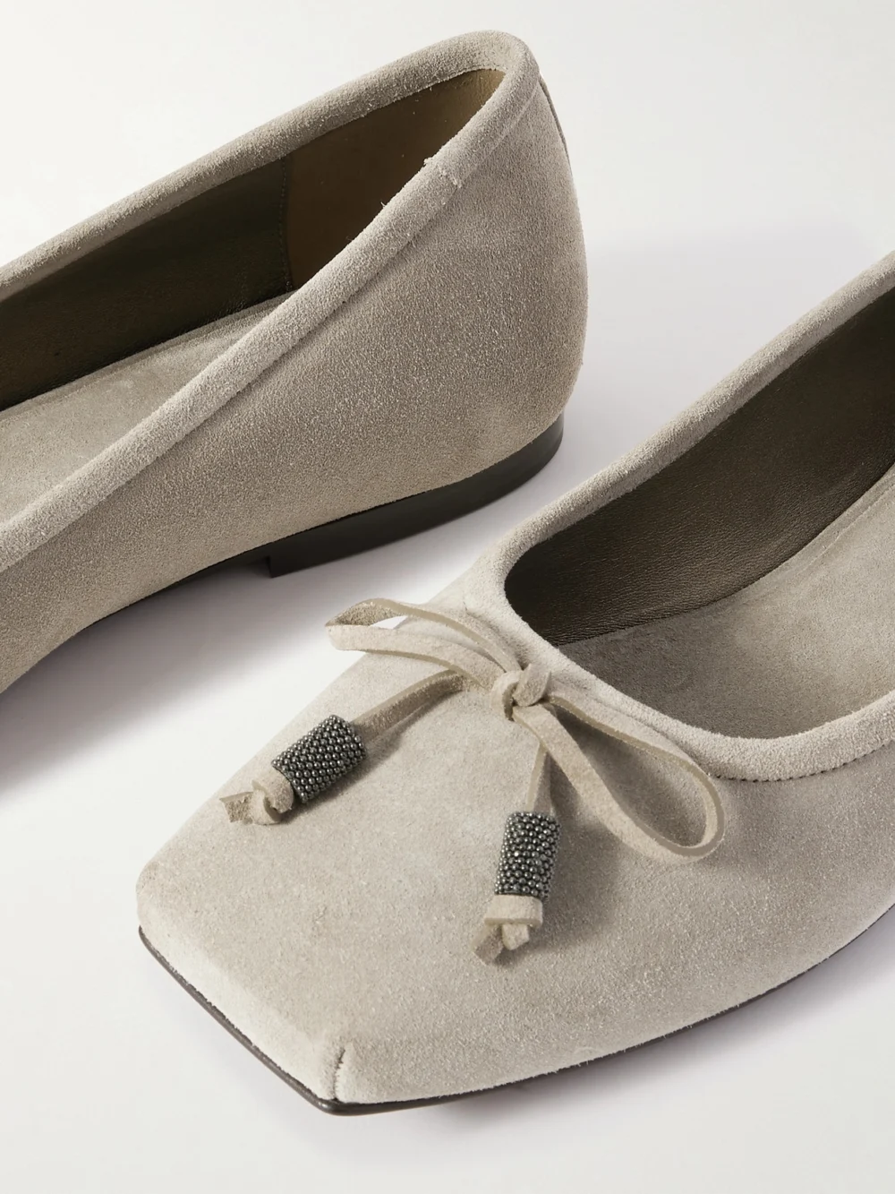 Close-up detail of the Brunello Cucinelli Bead-embellished Suede Ballet Flats