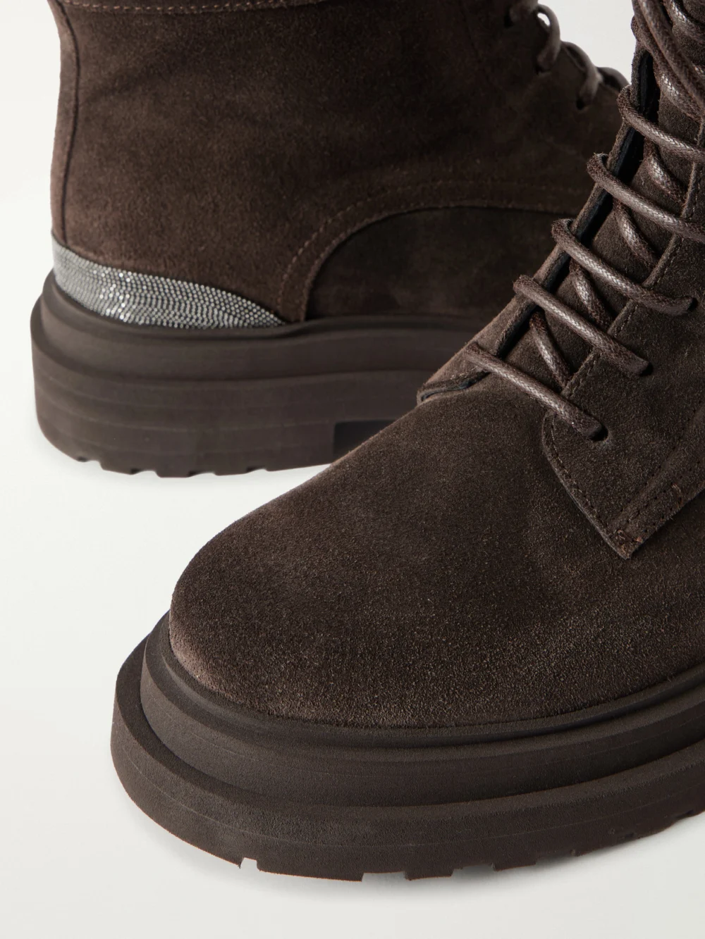 Close-up detail of the Brunello Cucinelli Bead-embellished Suede Knee Boots