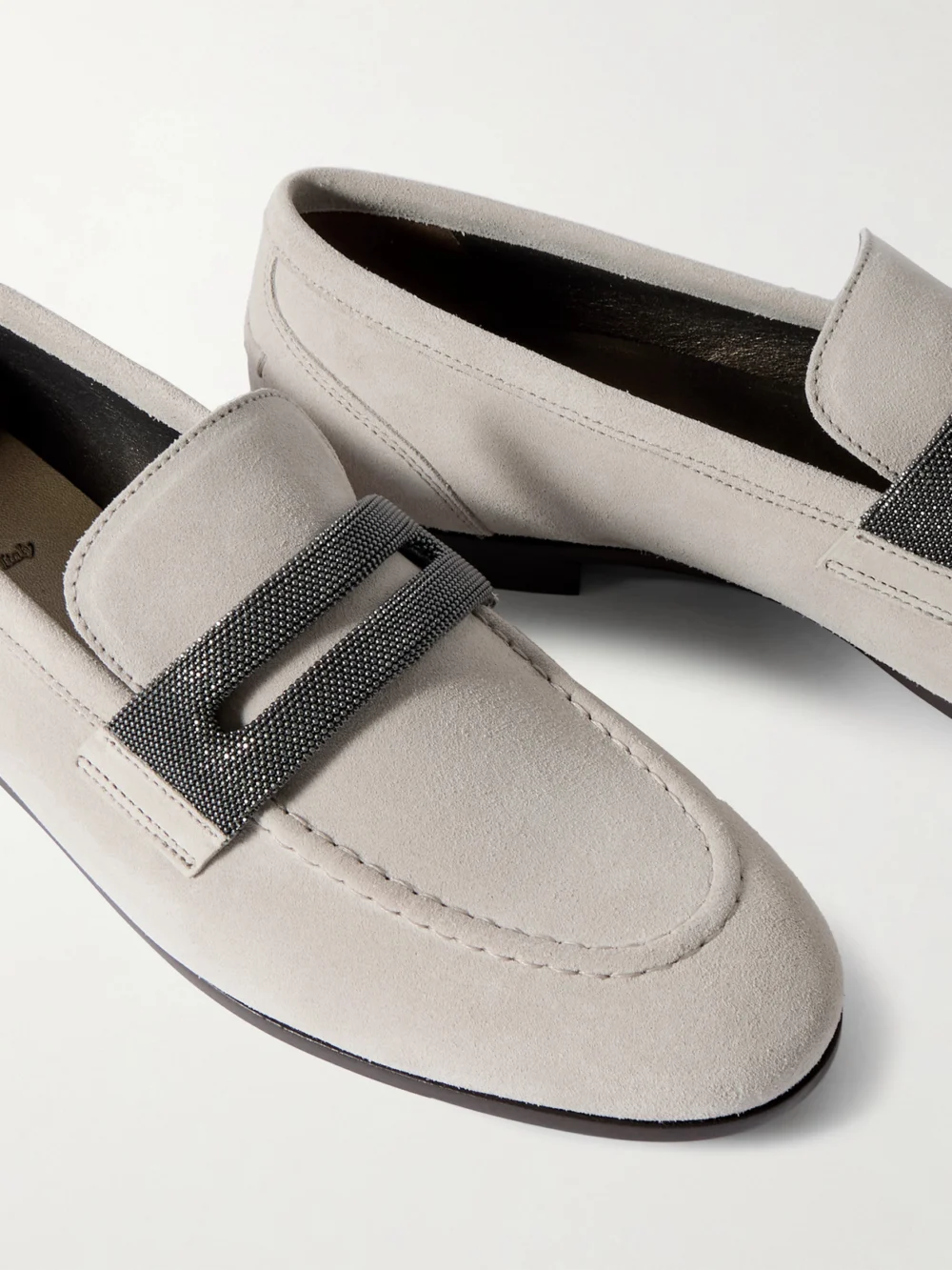 Close-up detail of the Brunello Cucinelli Bead-embellished Suede Loafers