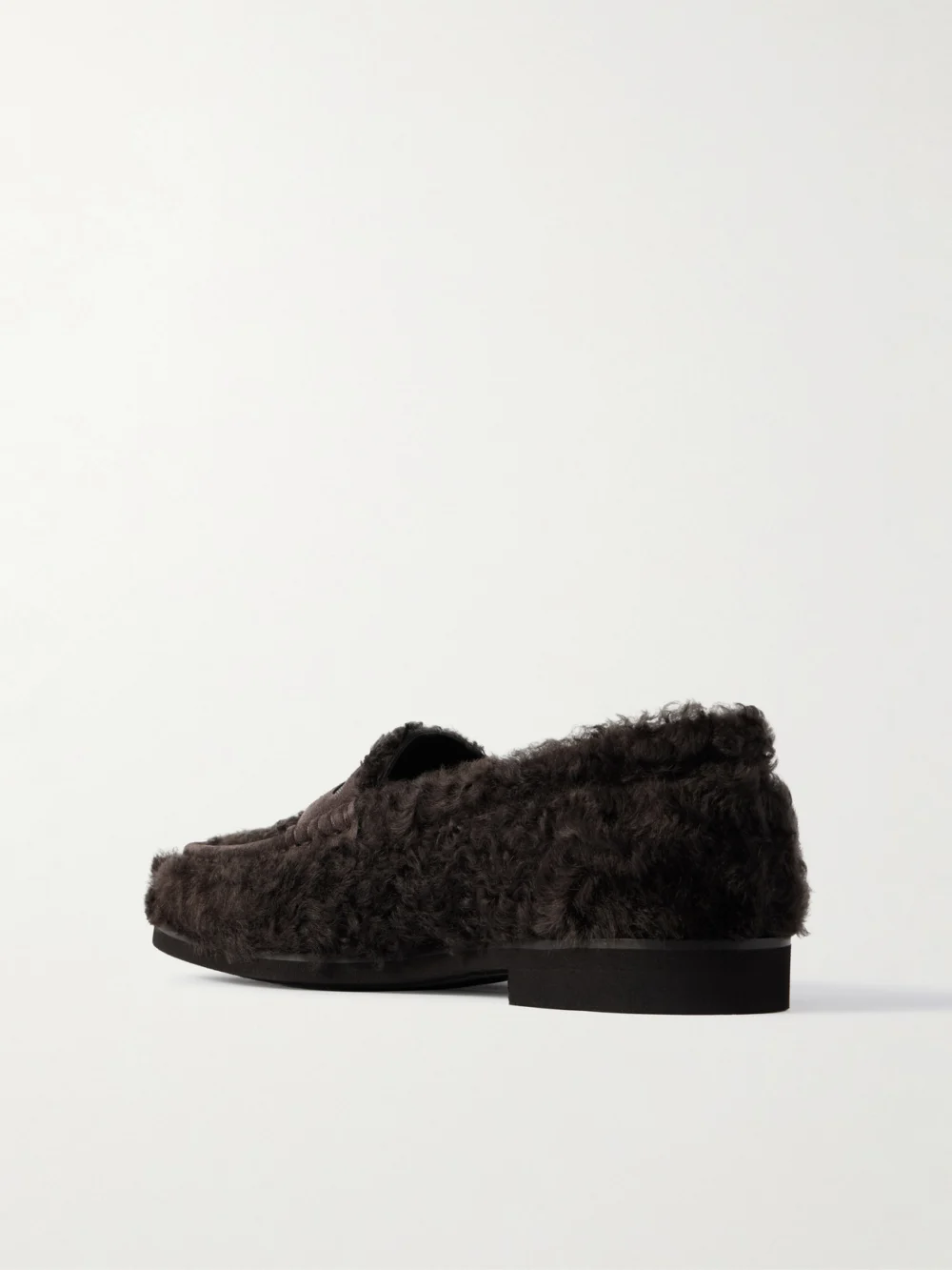 Back view of the Brunello Cucinelli Bead-embellished Suede-trimmed Shearling Loafers