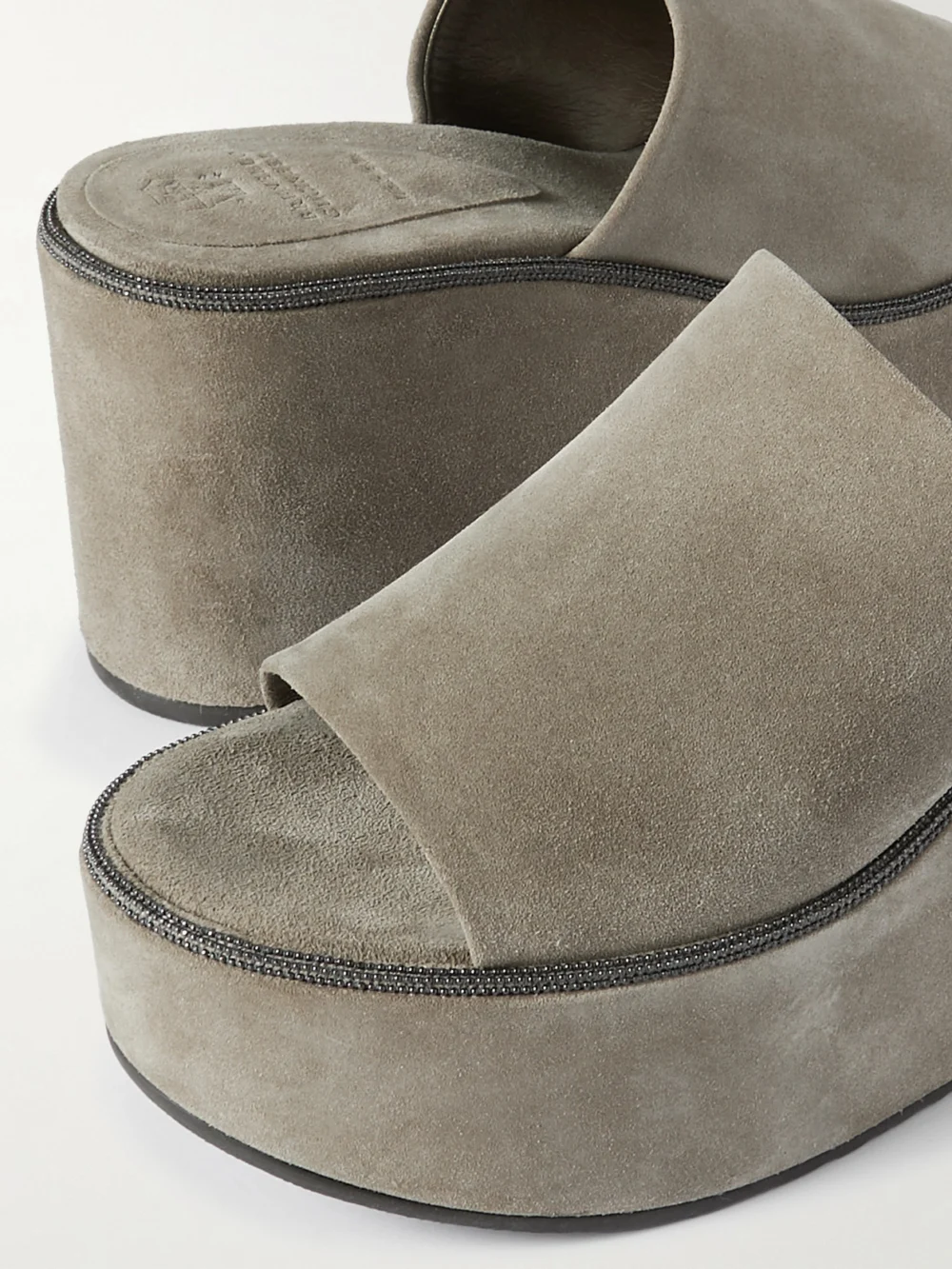 Close-up detail of the Brunello Cucinelli Bead-embellished Suede Wedge Mules