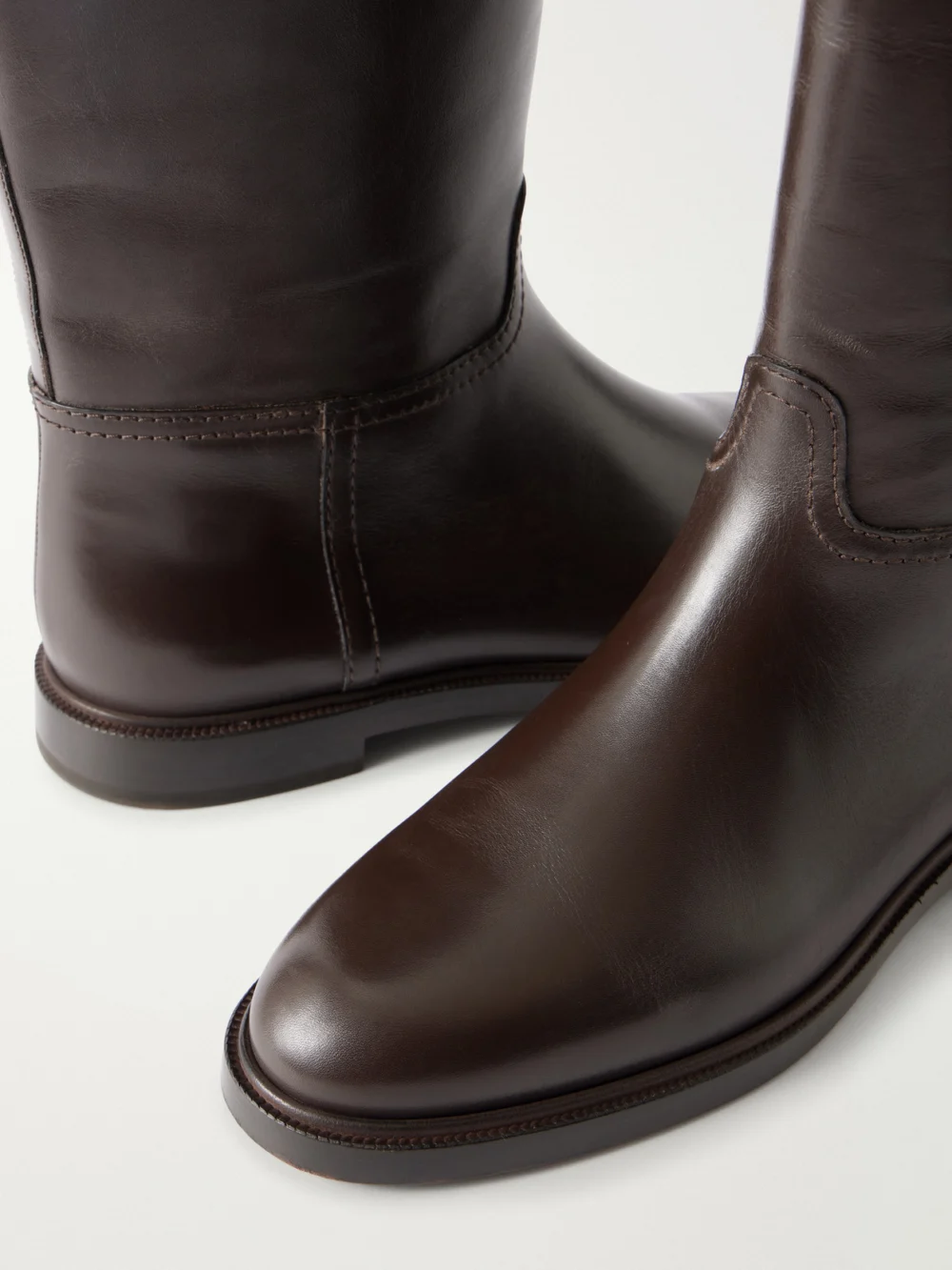Close-up detail of the Brunello Cucinelli Bead-embellished Wool-trimmed Leather Mid Calf Boots