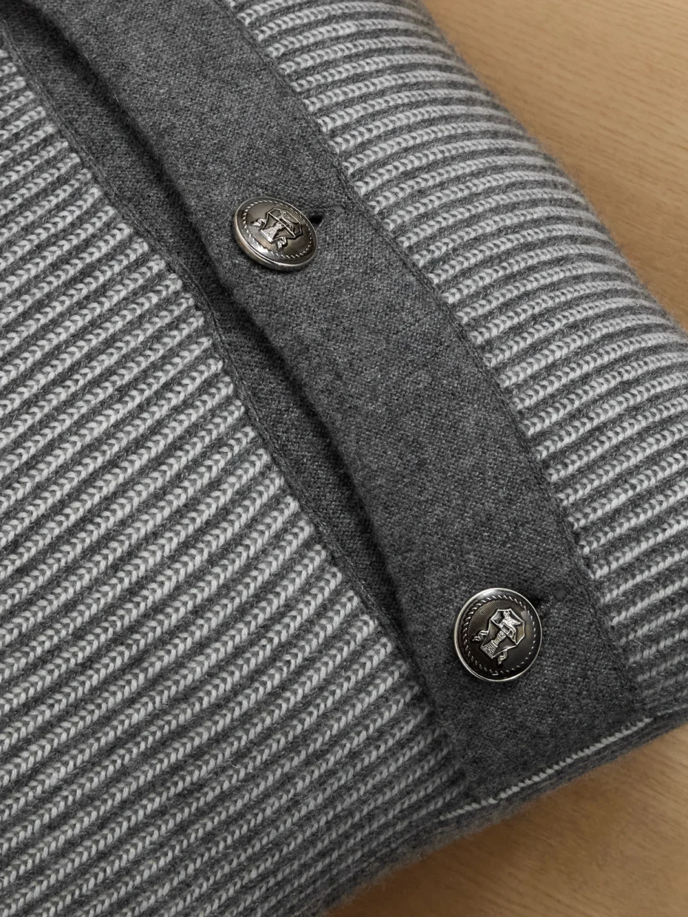 Close-up detail of the Brunello Cucinelli Button-detailed Ribbed Cashmere Cushion