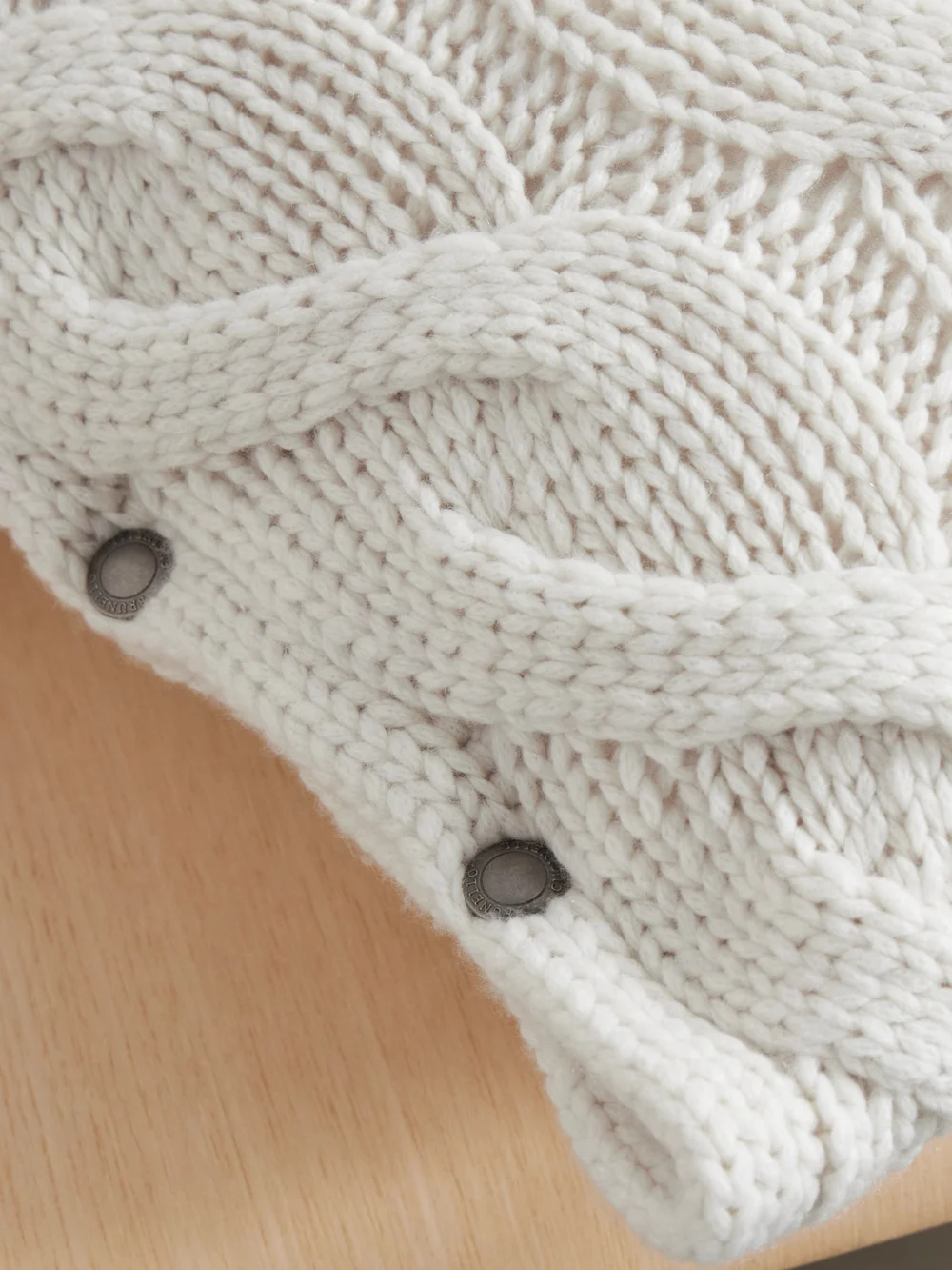 Close-up detail of the Brunello Cucinelli Cable-knit Cashmere Pillow