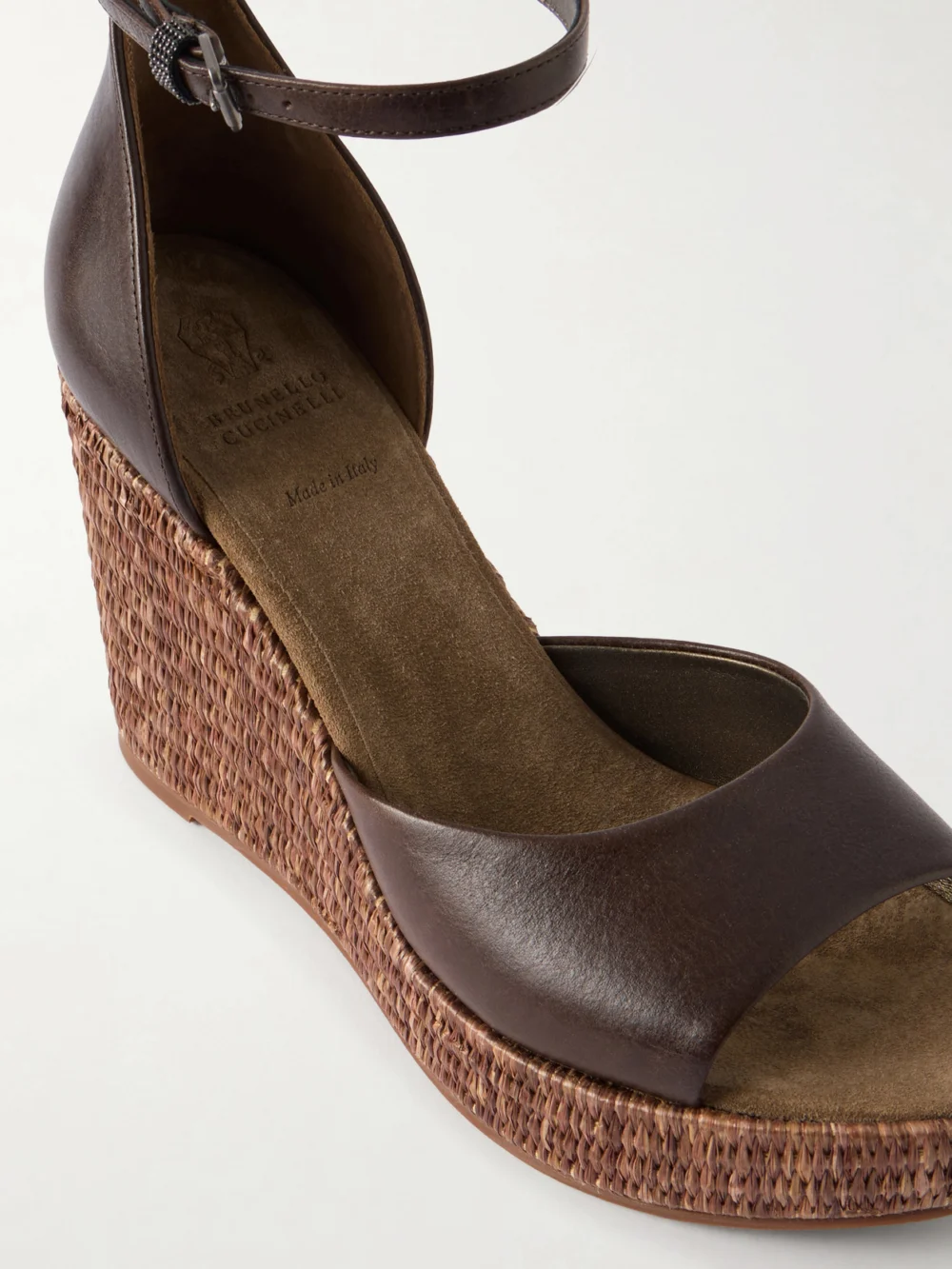 Close-up detail of the Brunello Cucinelli Embellished Leather Platform Wedge Espadrille Sandals