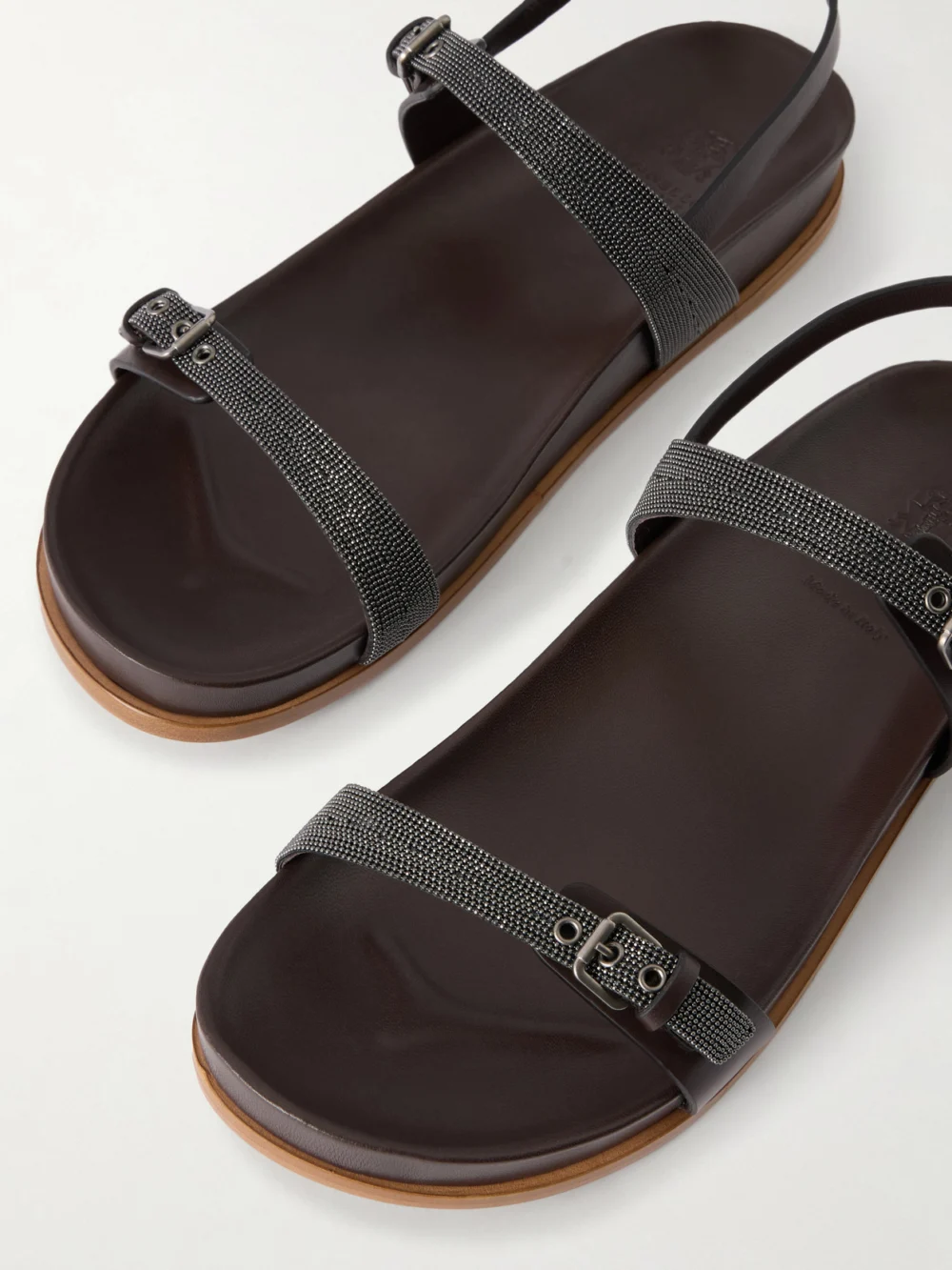 Close-up detail of the Brunello Cucinelli Embellished Leather Sandals