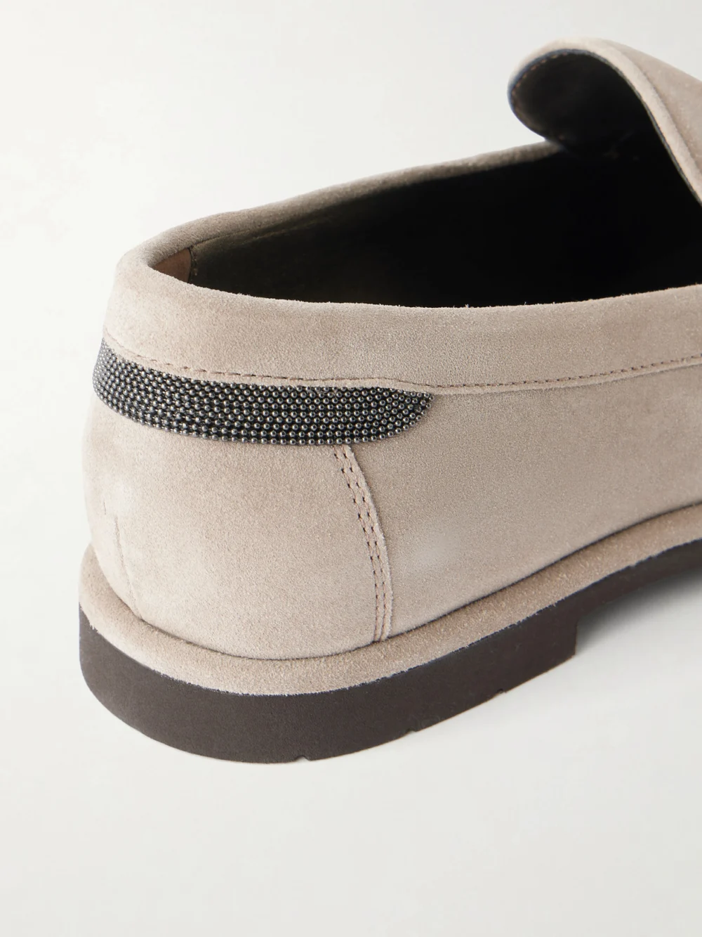 Close-up detail of the Brunello Cucinelli Embellished Suede Loafers