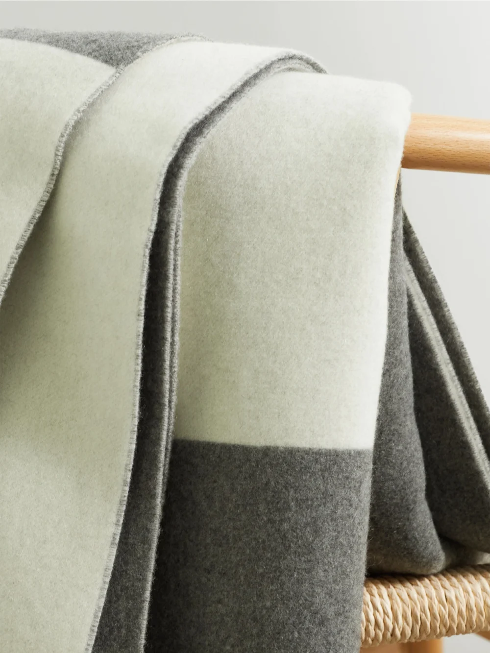 Close-up detail of the Brunello Cucinelli Fringed Cashmere Blanket