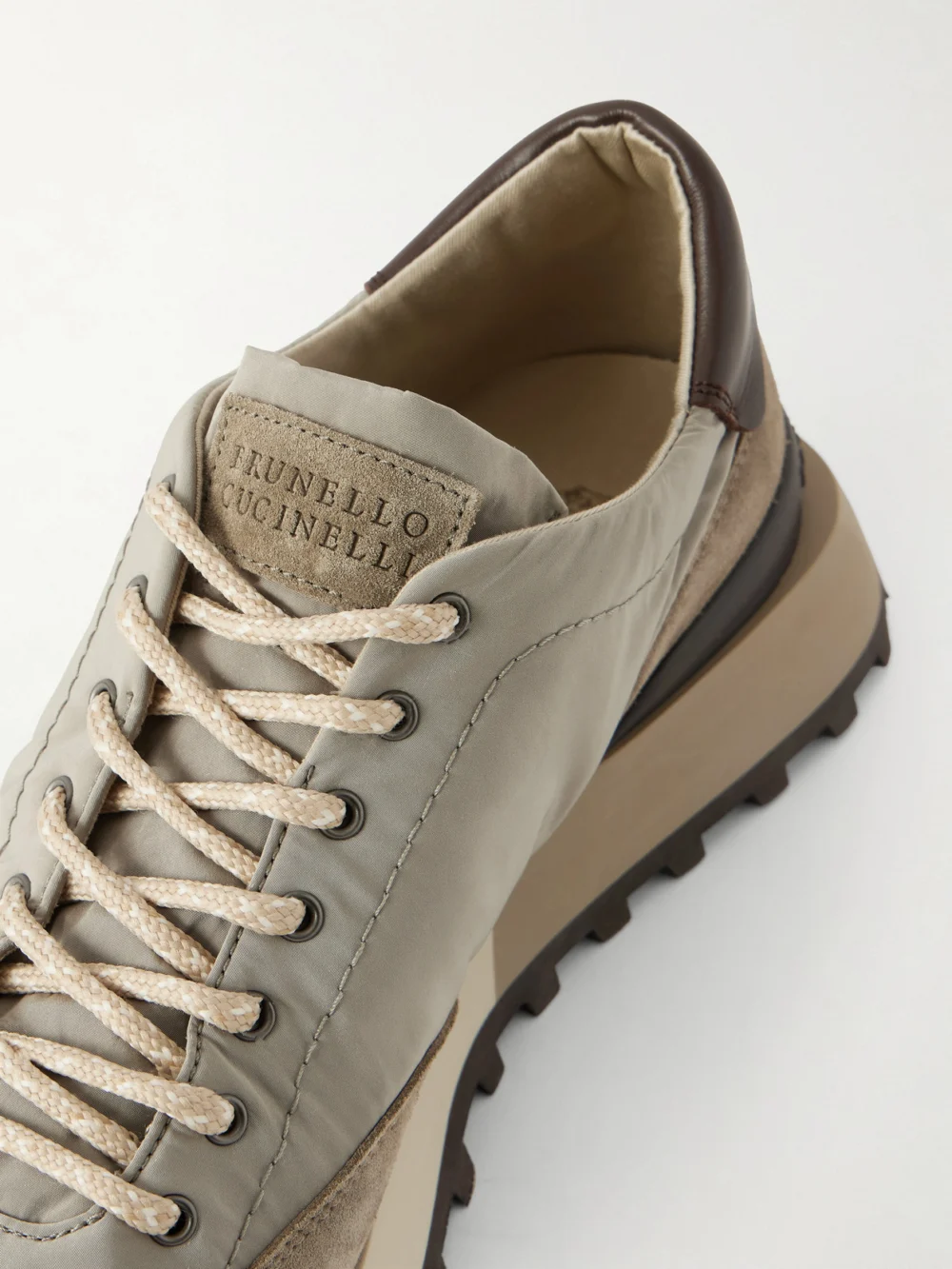 Close-up detail of the Brunello Cucinelli Leather and Suede-trimmed Shell Sneakers
