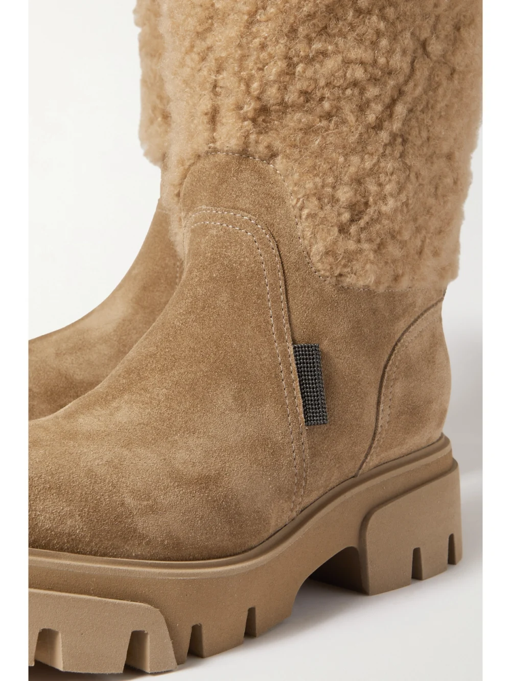 Close-up detail of the Brunello Cucinelli Shearling and Suede Ankle Boots
