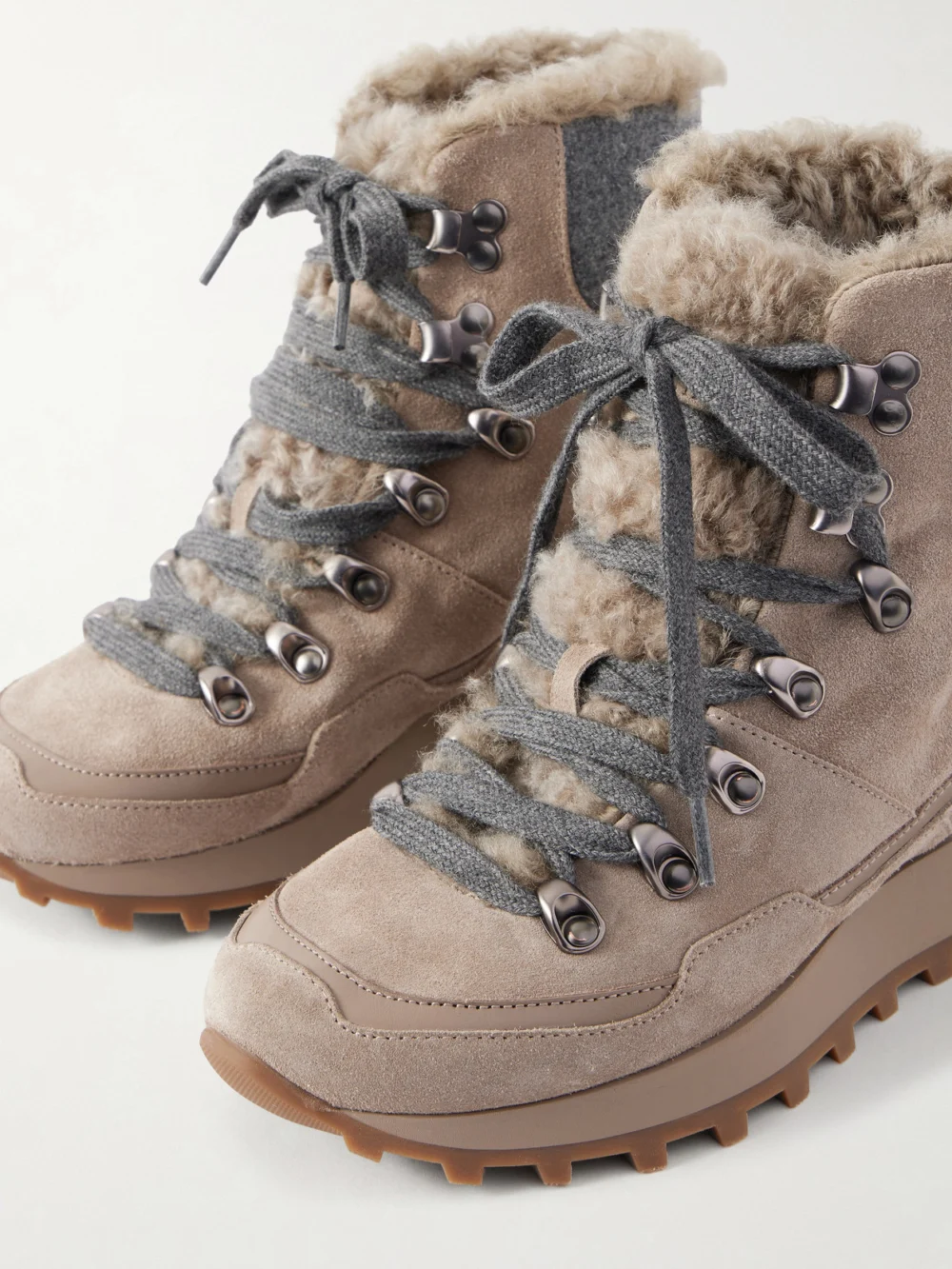Close-up detail of the Brunello Cucinelli Shearling-lined Wool-trimmed Suede Ankle Boots