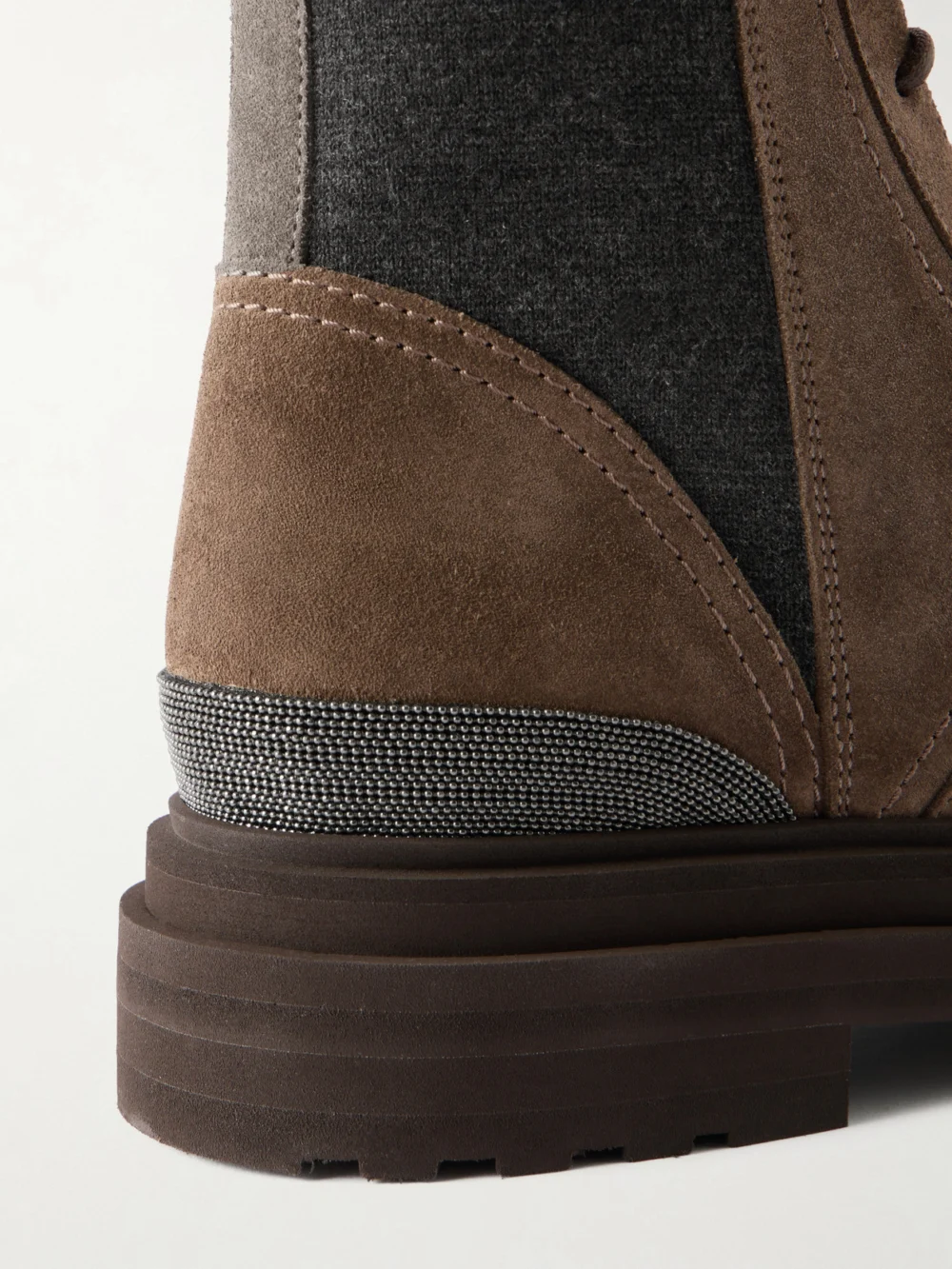 Close-up detail of the Brunello Cucinelli Suede Ankle Combat Boots