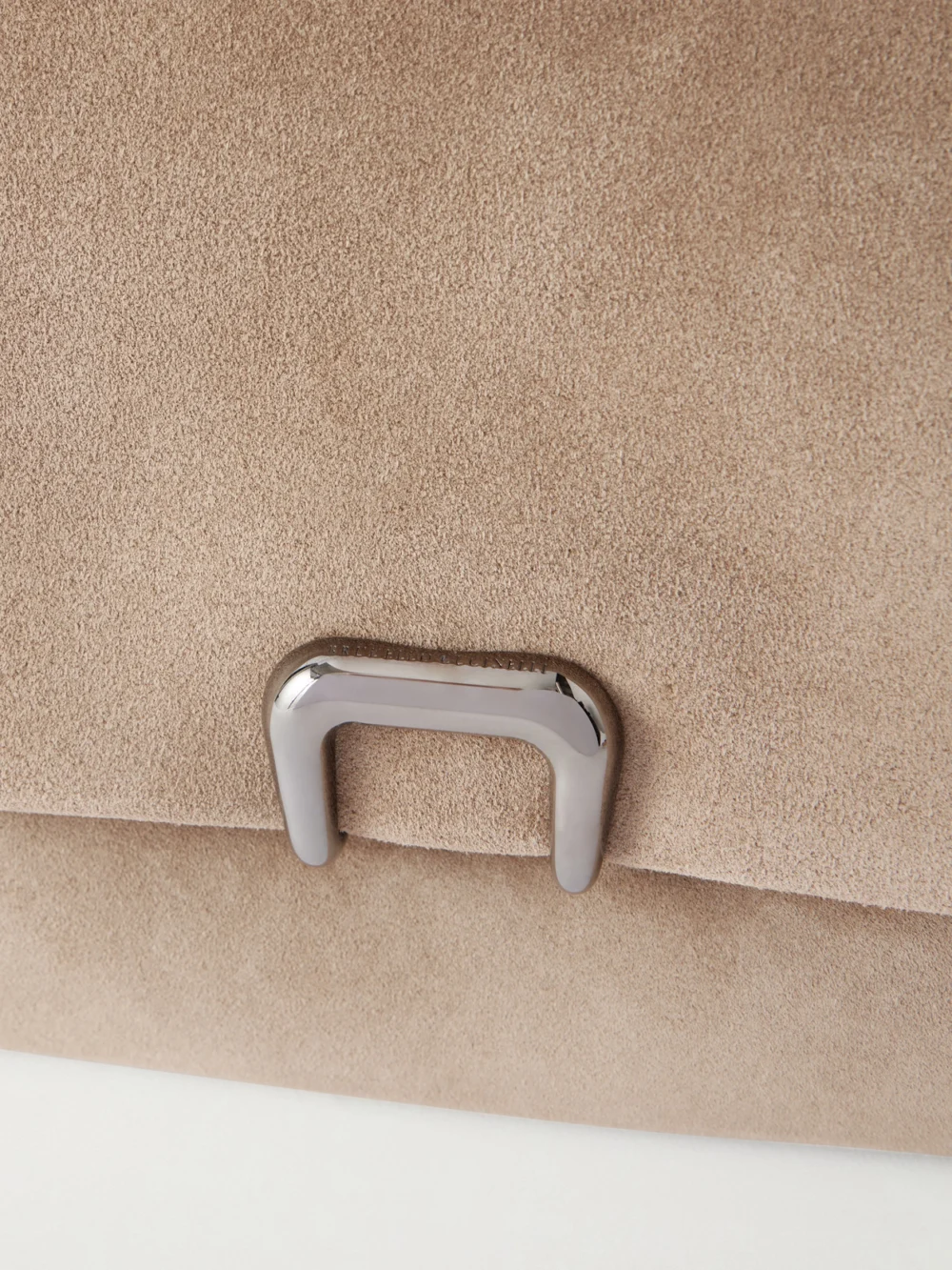 Close-up detail of the Brunello Cucinelli Suede Clutch